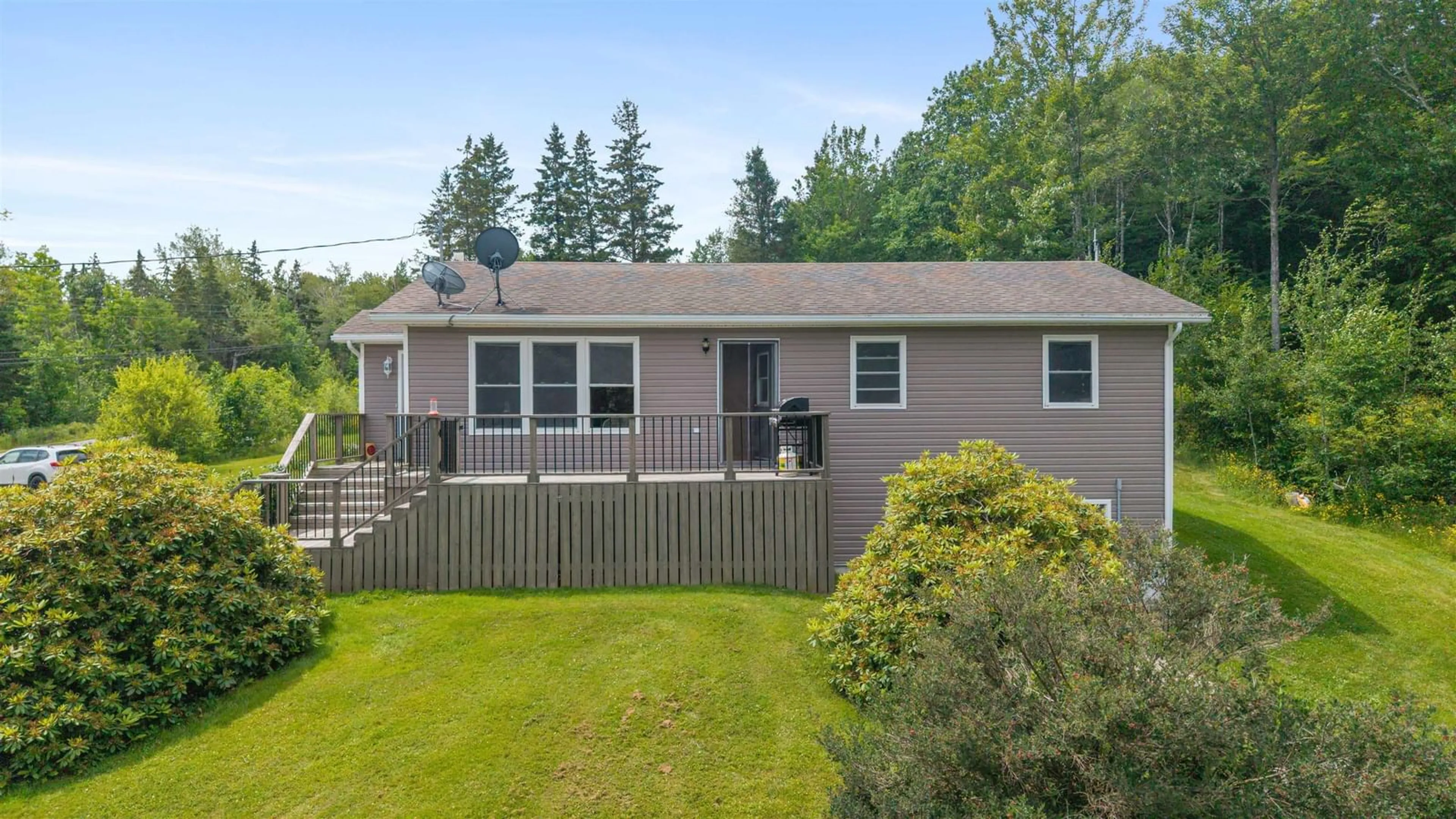 Home with vinyl exterior material, street for 1781 Montreal Rd, Rocklin Nova Scotia B0K 2A0