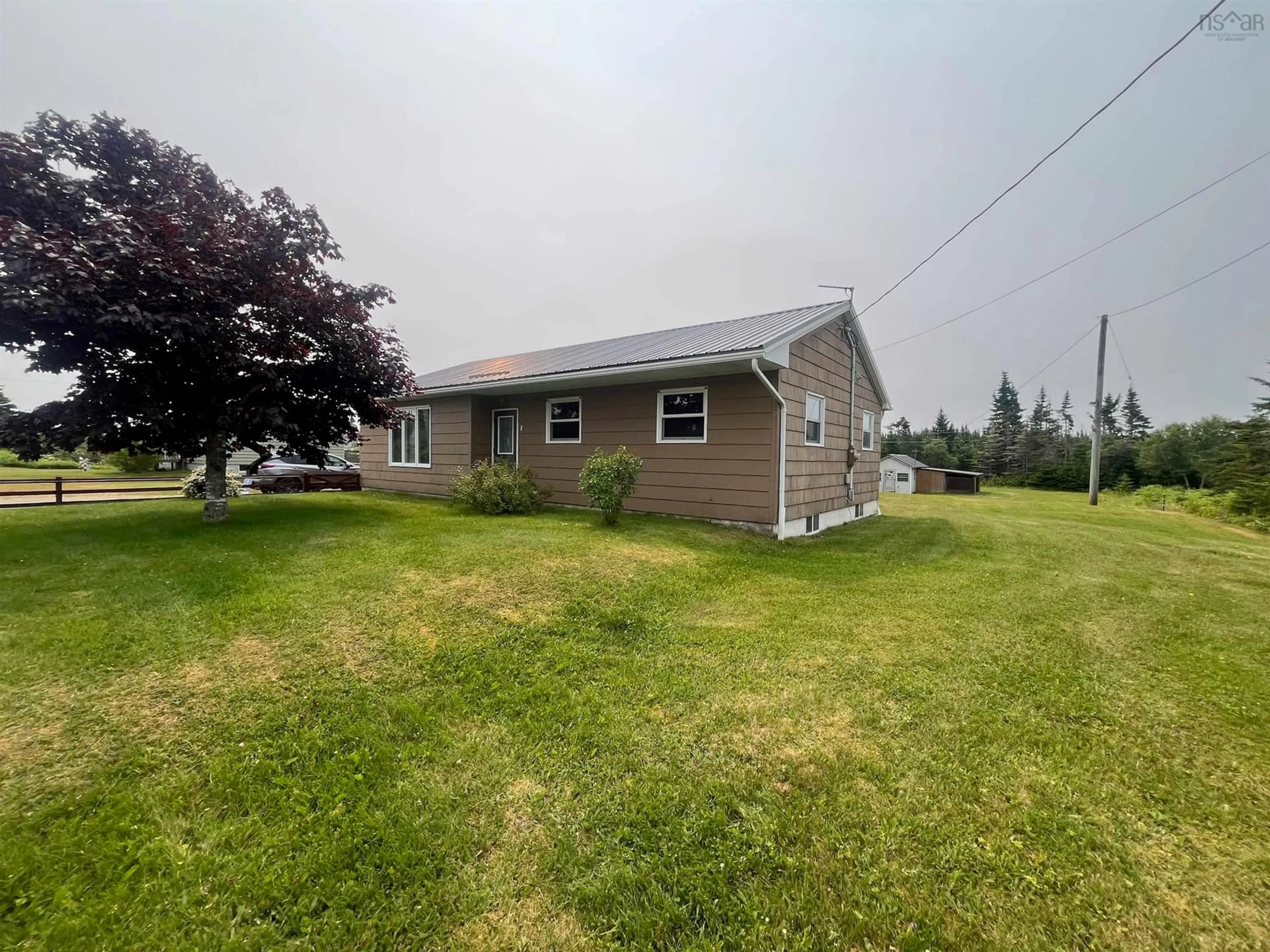A pic from outside/outdoor area/front of a property/back of a property/a pic from drone, unknown for 4834 Highway 211, Port Bickerton Nova Scotia B0J 1A0