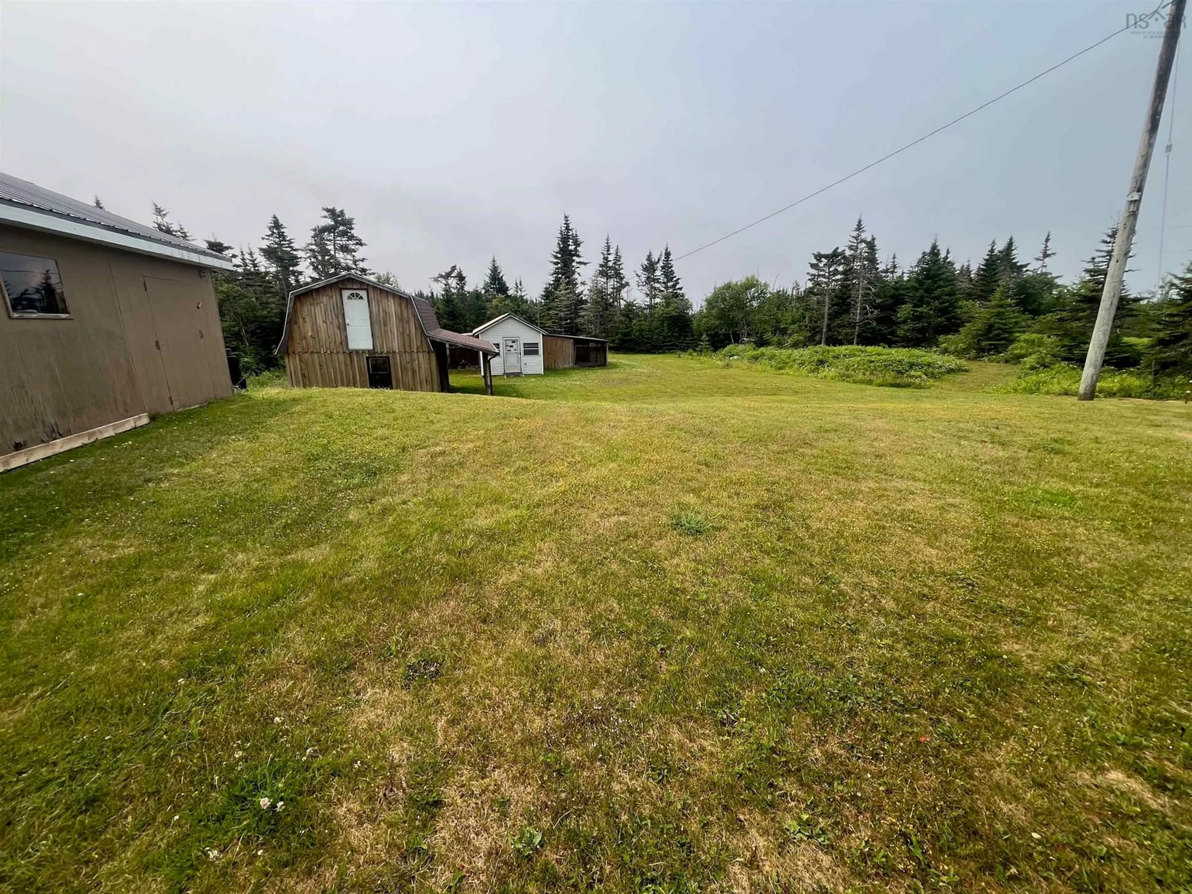 A pic from outside/outdoor area/front of a property/back of a property/a pic from drone, unknown for 4834 Highway 211, Port Bickerton Nova Scotia B0J 1A0