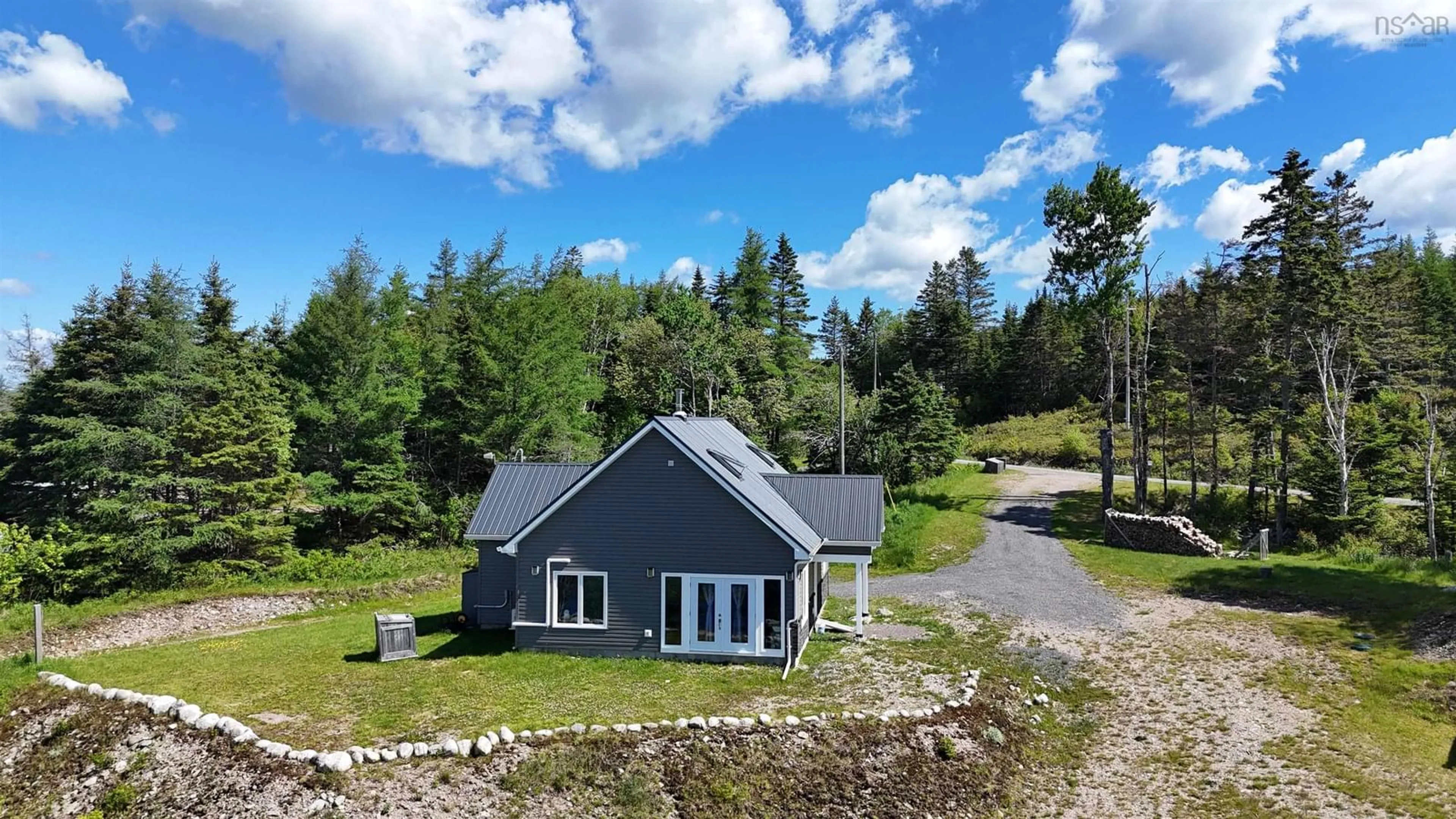 A pic from outside/outdoor area/front of a property/back of a property/a pic from drone, building for 2100 Highway 211, Indian Harbour Lake Nova Scotia B0J 3C0