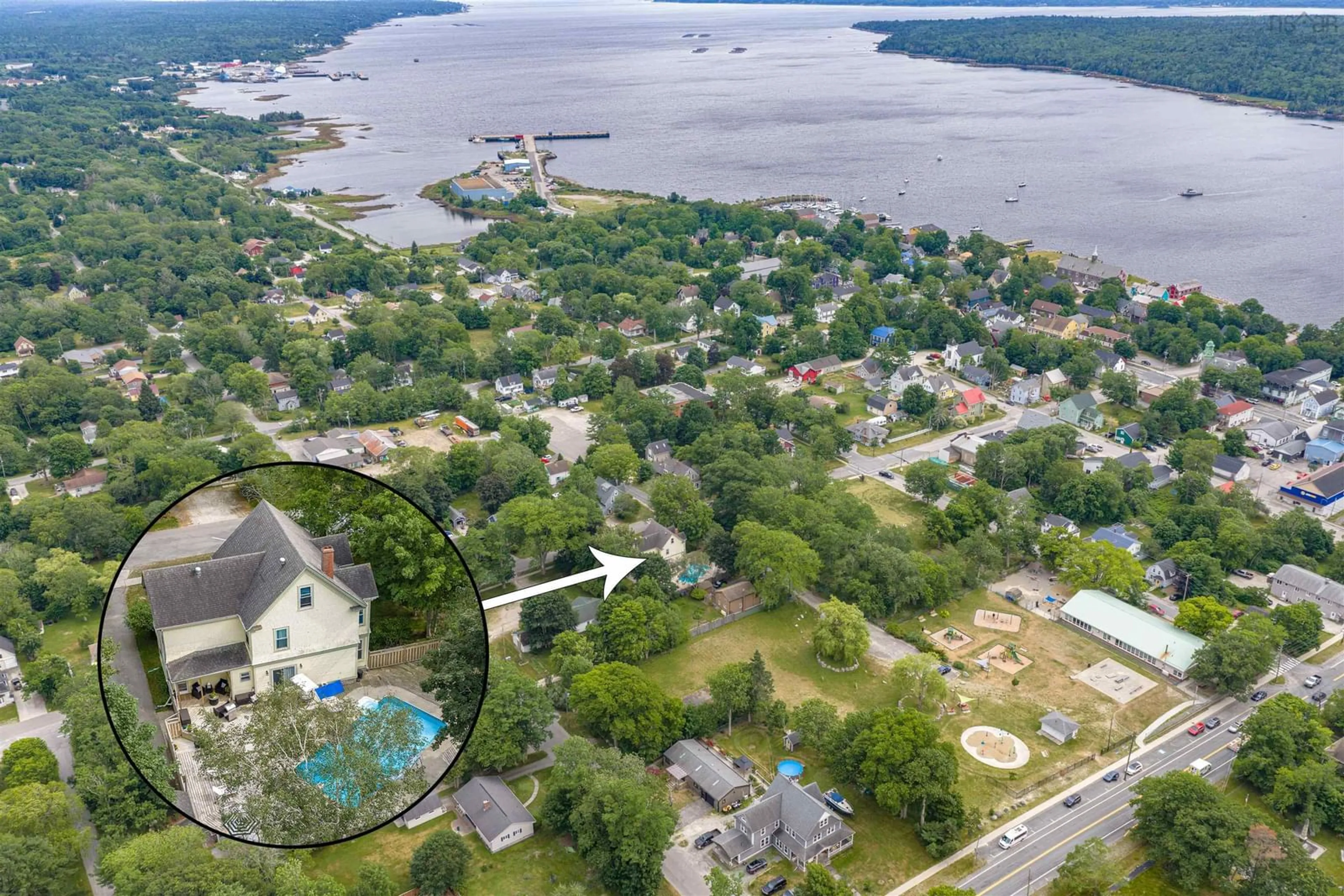 A pic from outside/outdoor area/front of a property/back of a property/a pic from drone, water/lake/river/ocean view for 44 John St, Shelburne Nova Scotia B0T 1W0