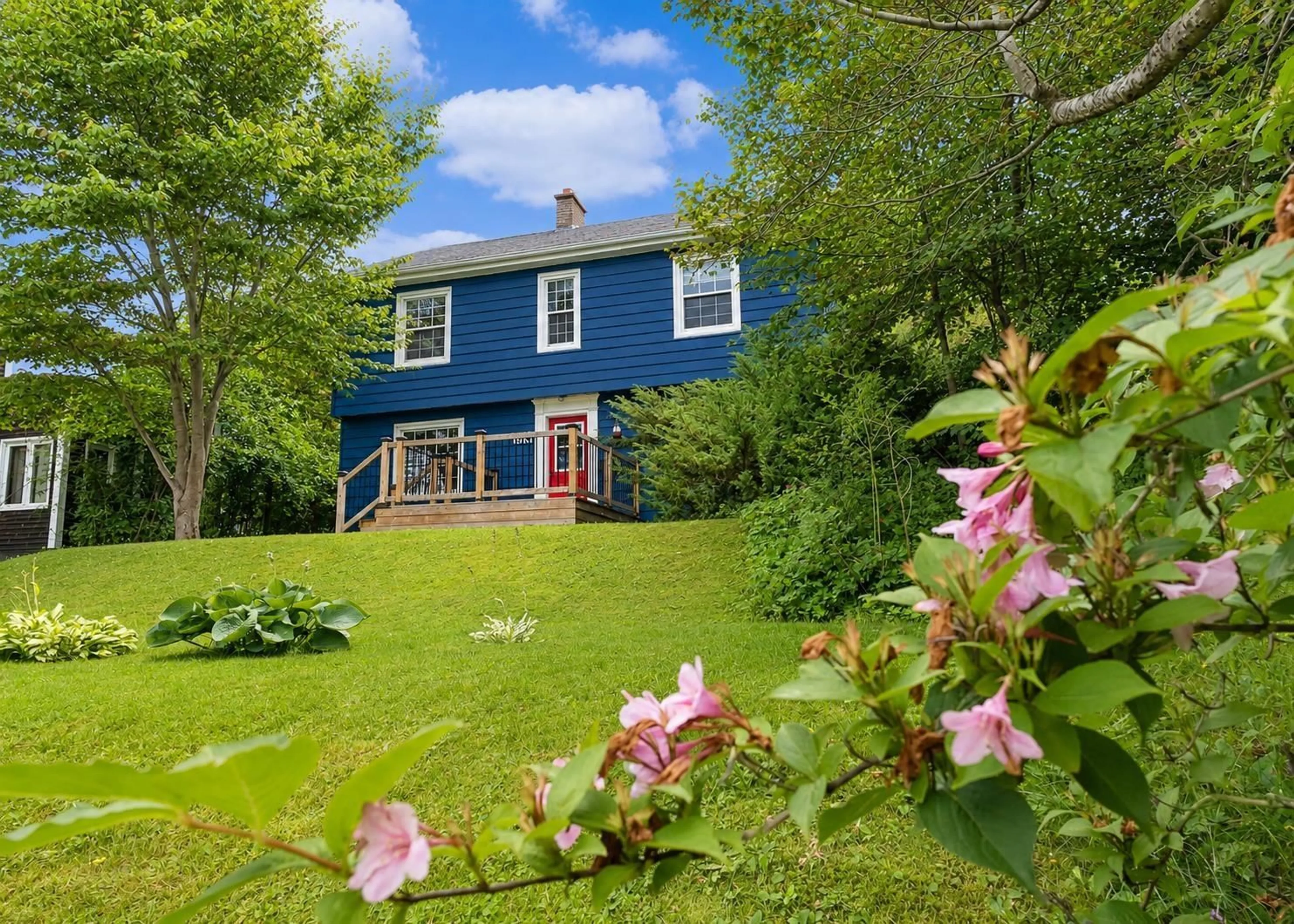 A pic from outside/outdoor area/front of a property/back of a property/a pic from drone, unknown for 693 Kings Rd, Sydney River Nova Scotia B1S 1C1