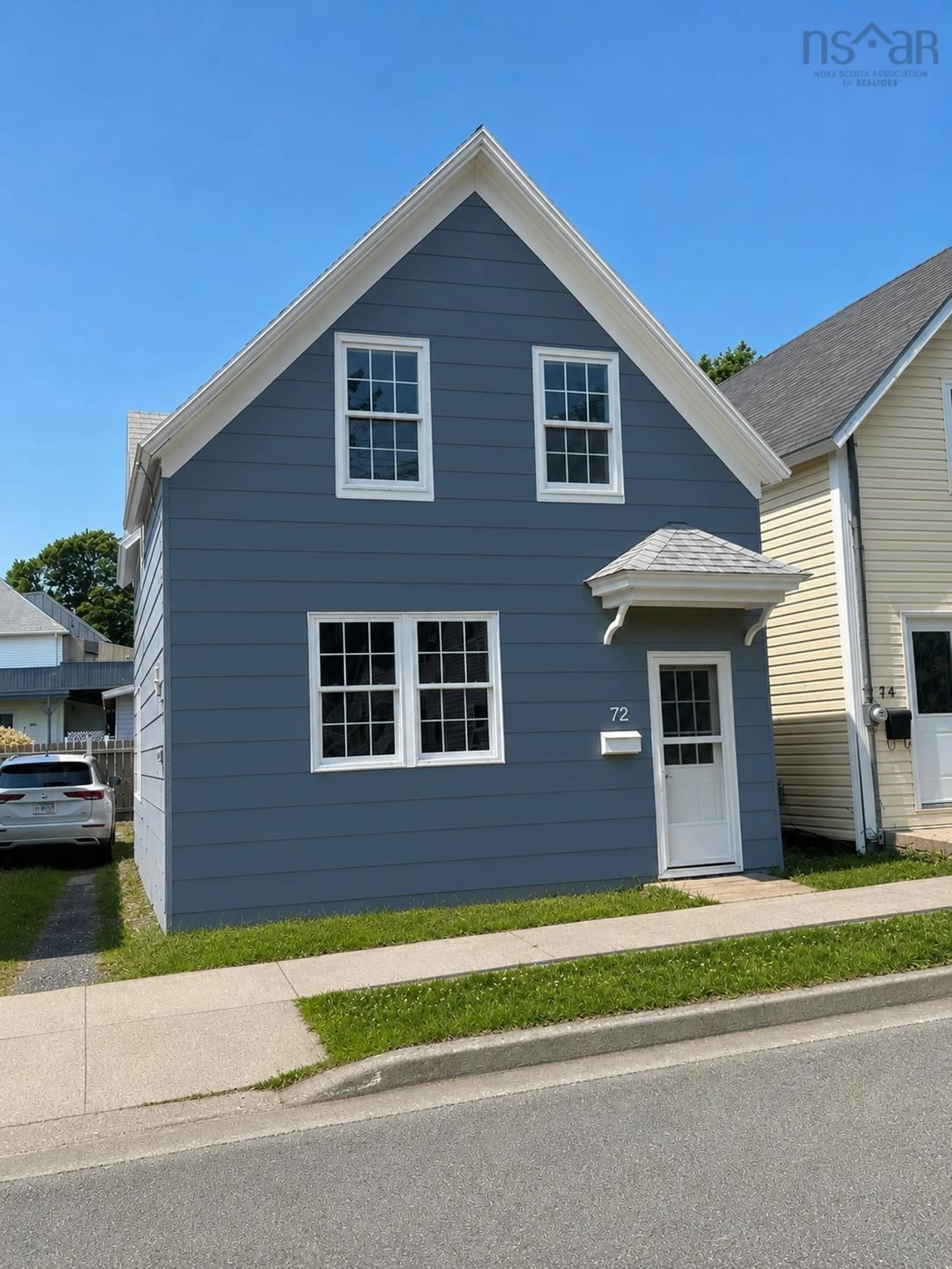 Home with vinyl exterior material, street for 72 Pierce St, North Sydney Nova Scotia B2A 1N4