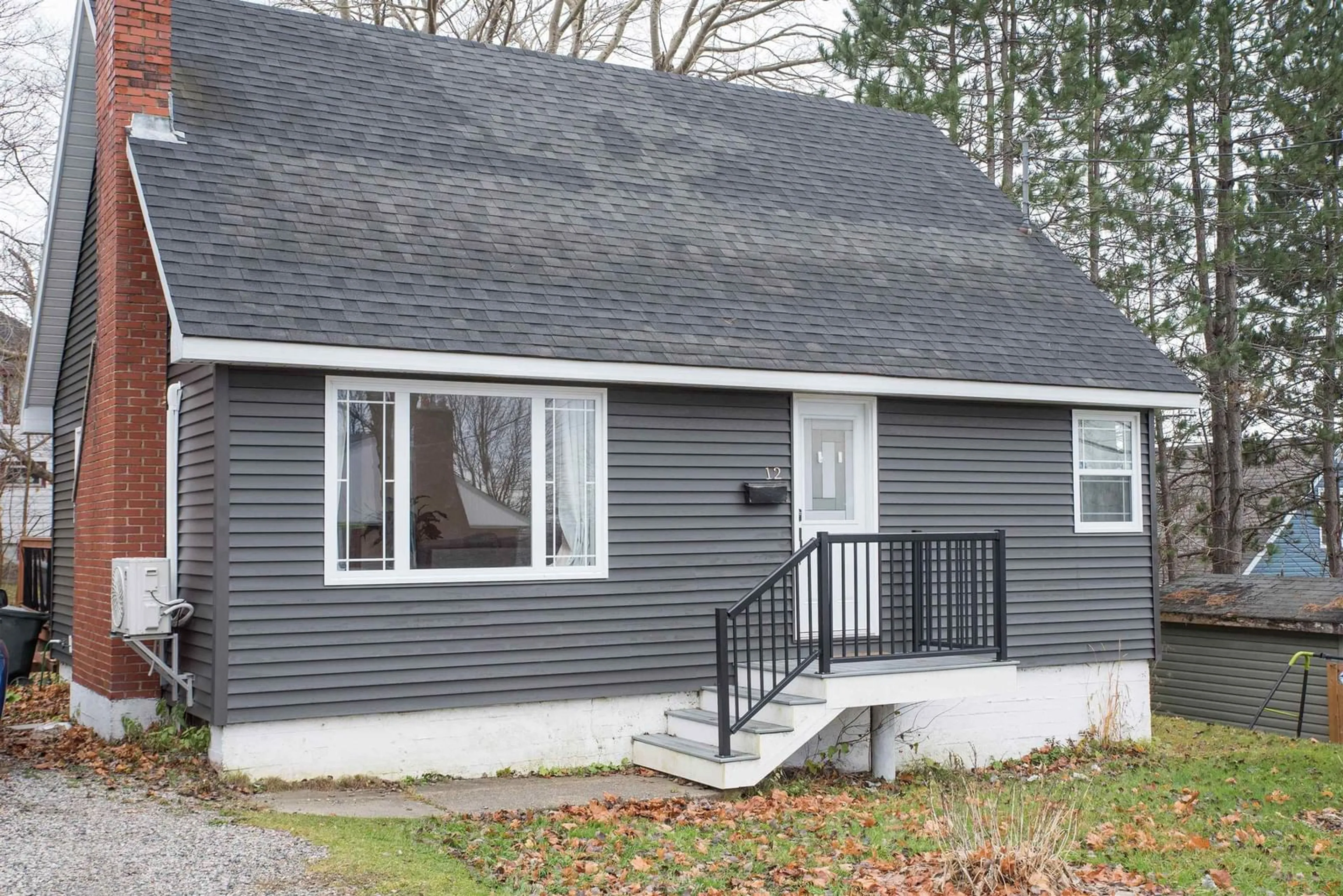 Home with vinyl exterior material, street for 12 Lynch, Sydney River Nova Scotia B1S 1V2