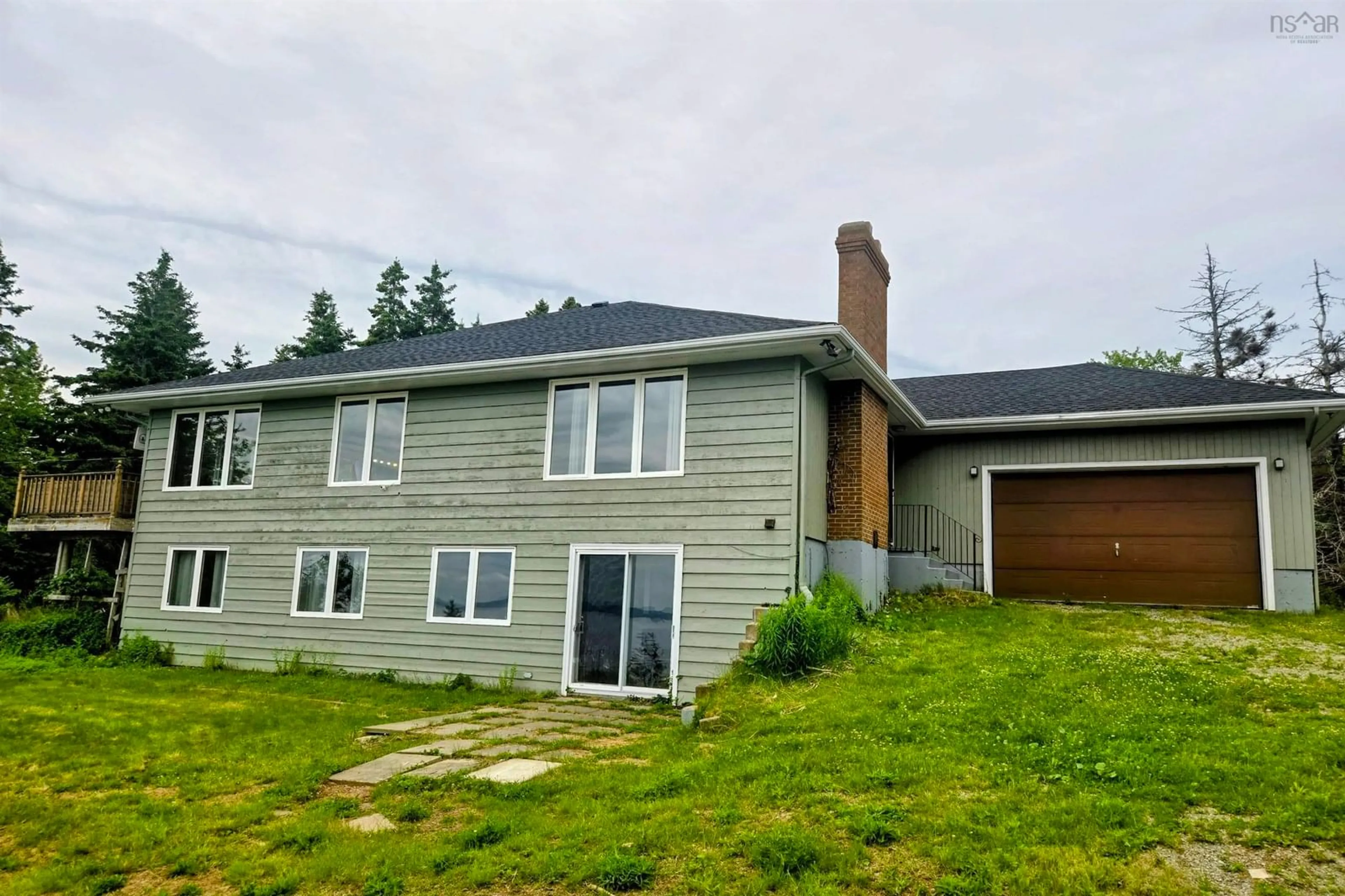 A pic from outside/outdoor area/front of a property/back of a property/a pic from drone, unknown for 601 Derby Point Rd, Grand Narrows Nova Scotia B1T 1E3
