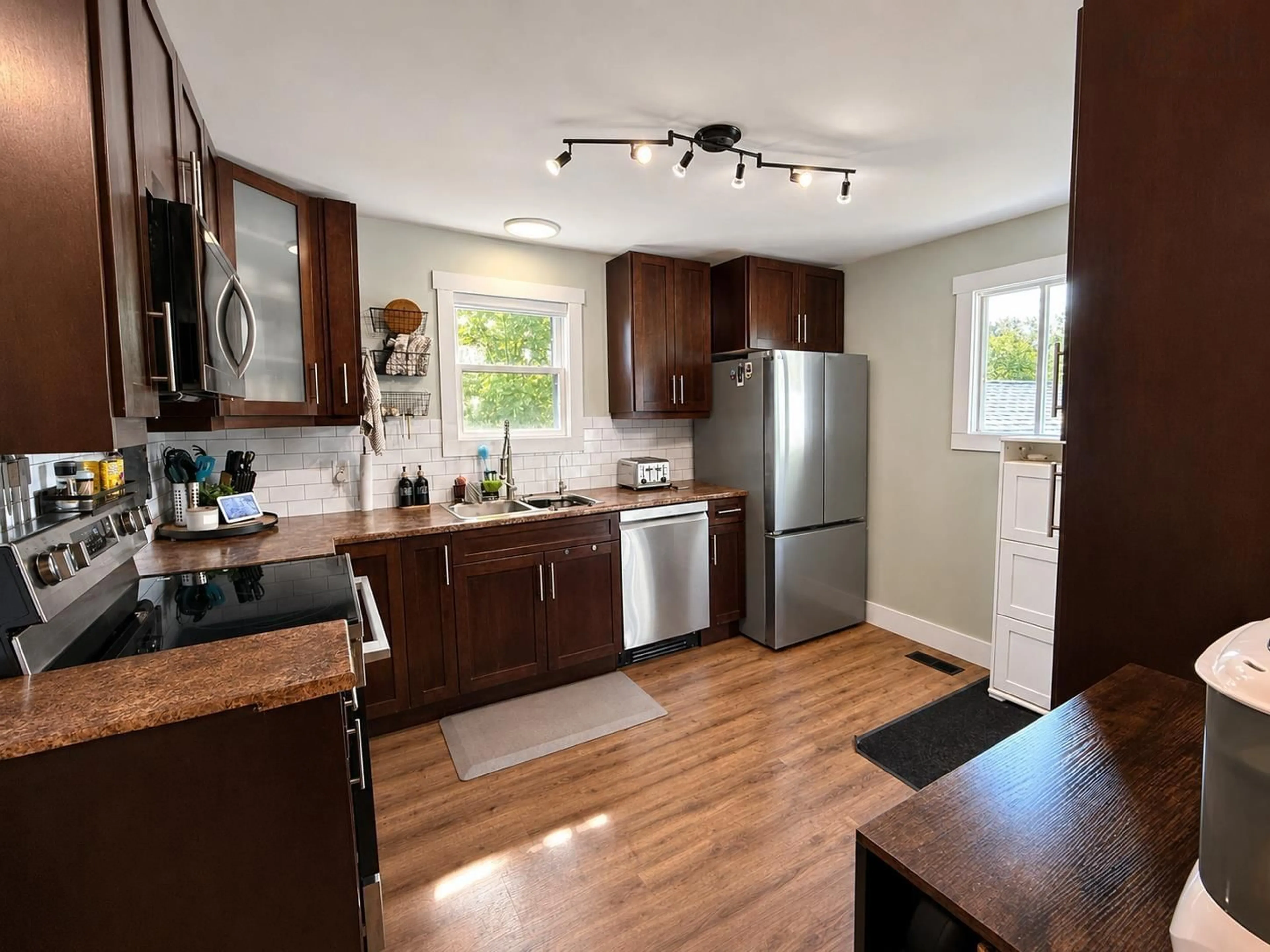 Open concept kitchen, wood/laminate floor for 364 Queen St, Truro Nova Scotia B2N 2C3