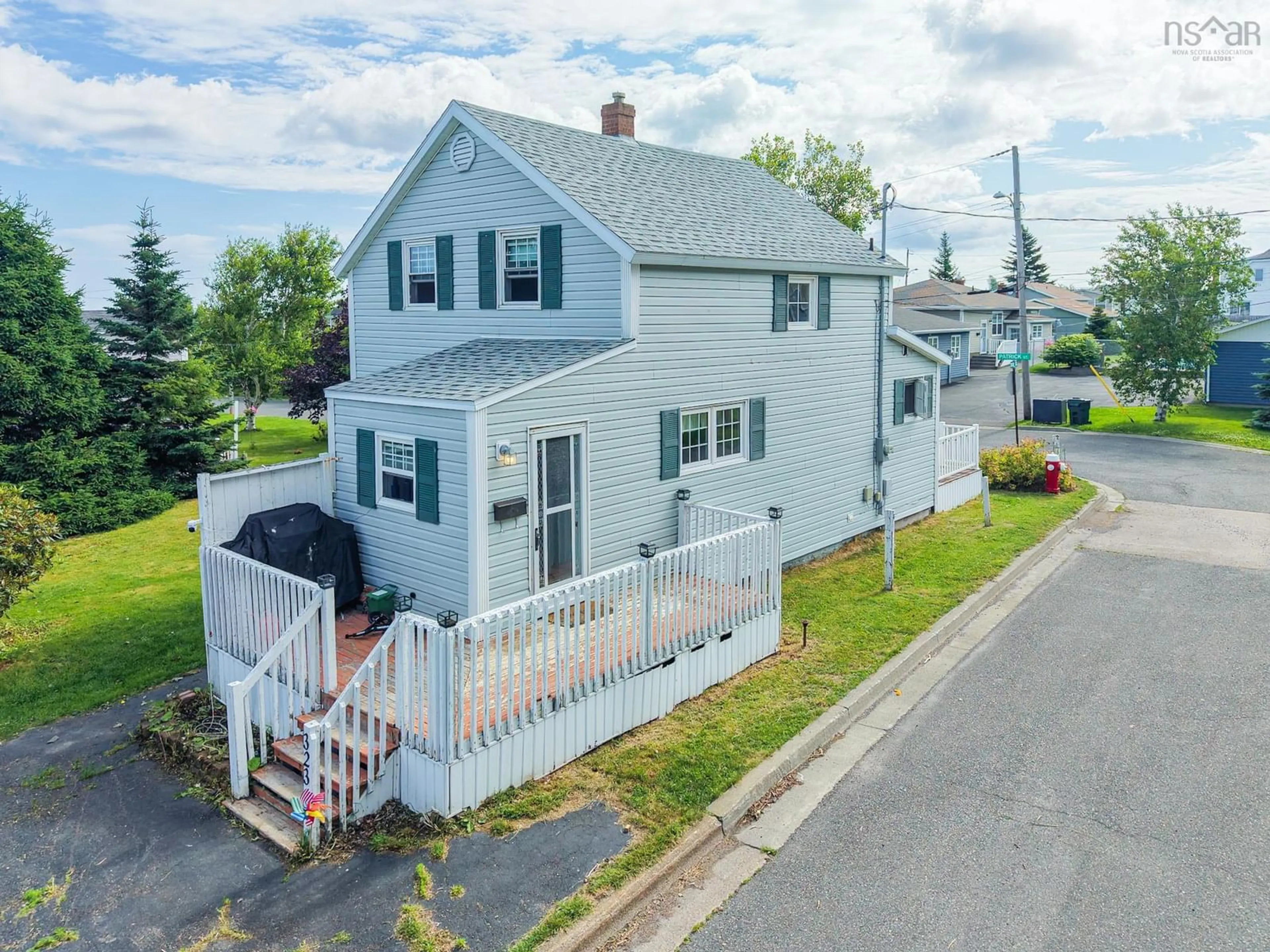 A pic from outside/outdoor area/front of a property/back of a property/a pic from drone, street for 323 Patrick St, New Waterford Nova Scotia B1H 3M8