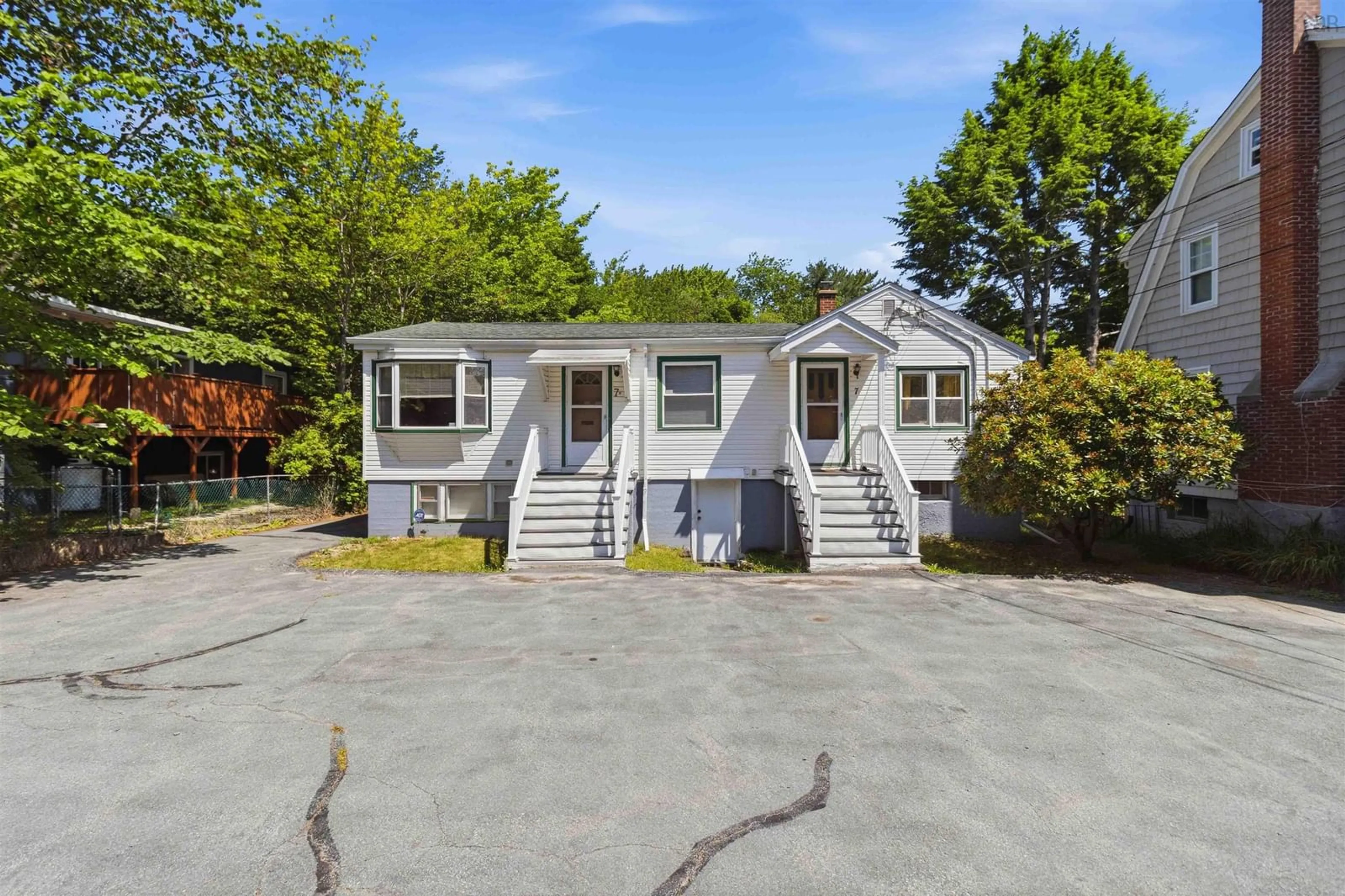 A pic from outside/outdoor area/front of a property/back of a property/a pic from drone, street for 7 & 7A Melwood Ave, Armdale Nova Scotia B3N 1E4