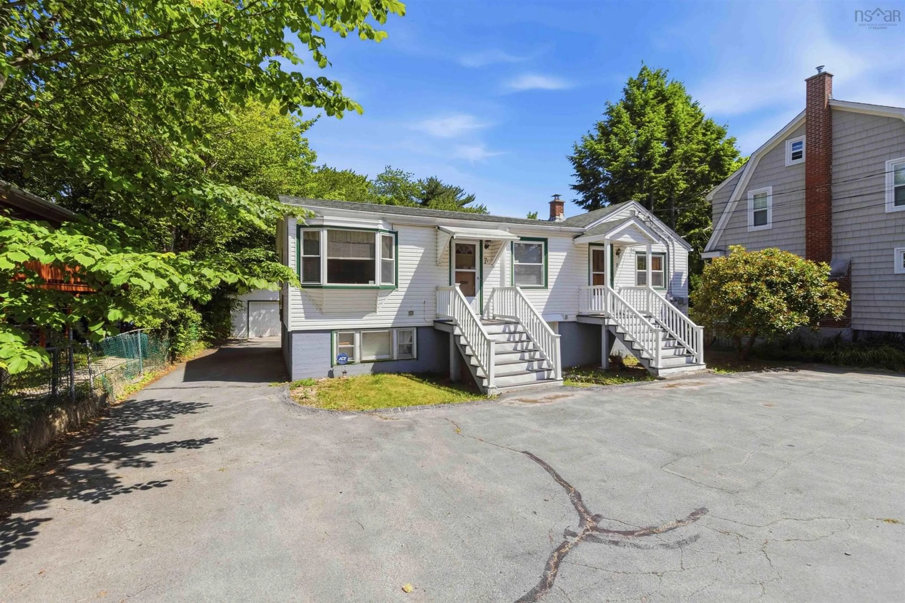 A pic from outside/outdoor area/front of a property/back of a property/a pic from drone, street for 7 & 7A Melwood Ave, Armdale Nova Scotia B3N 1E4