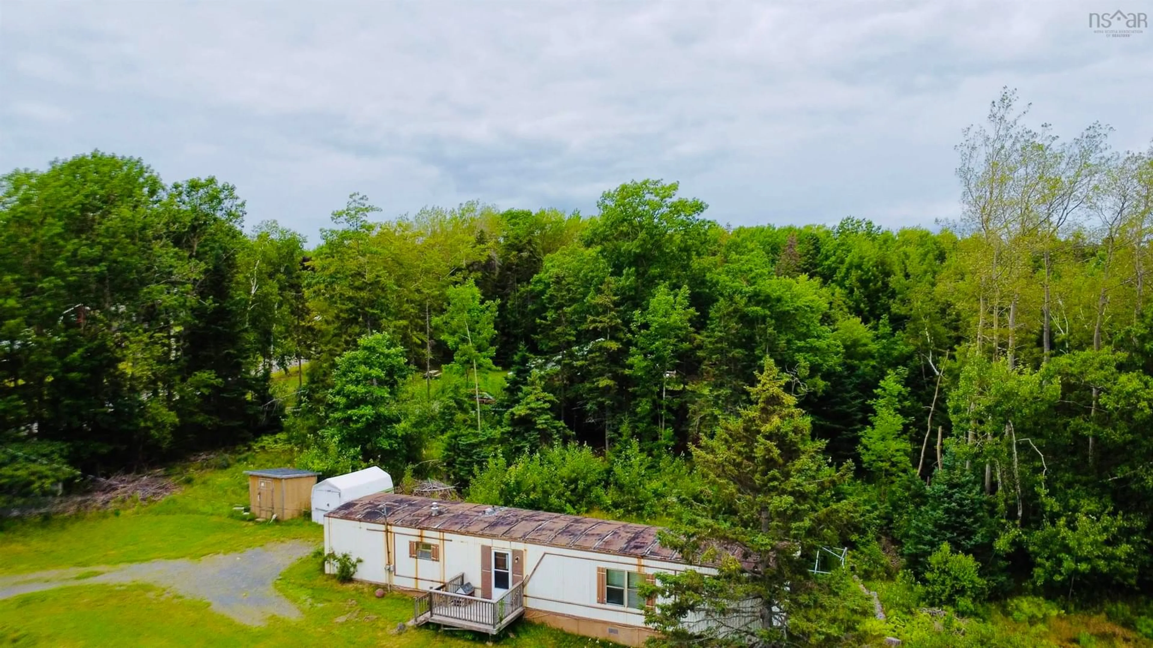 A pic from outside/outdoor area/front of a property/back of a property/a pic from drone, forest/trees view for Bayview Road #28, Bay View Nova Scotia B0K 1H0