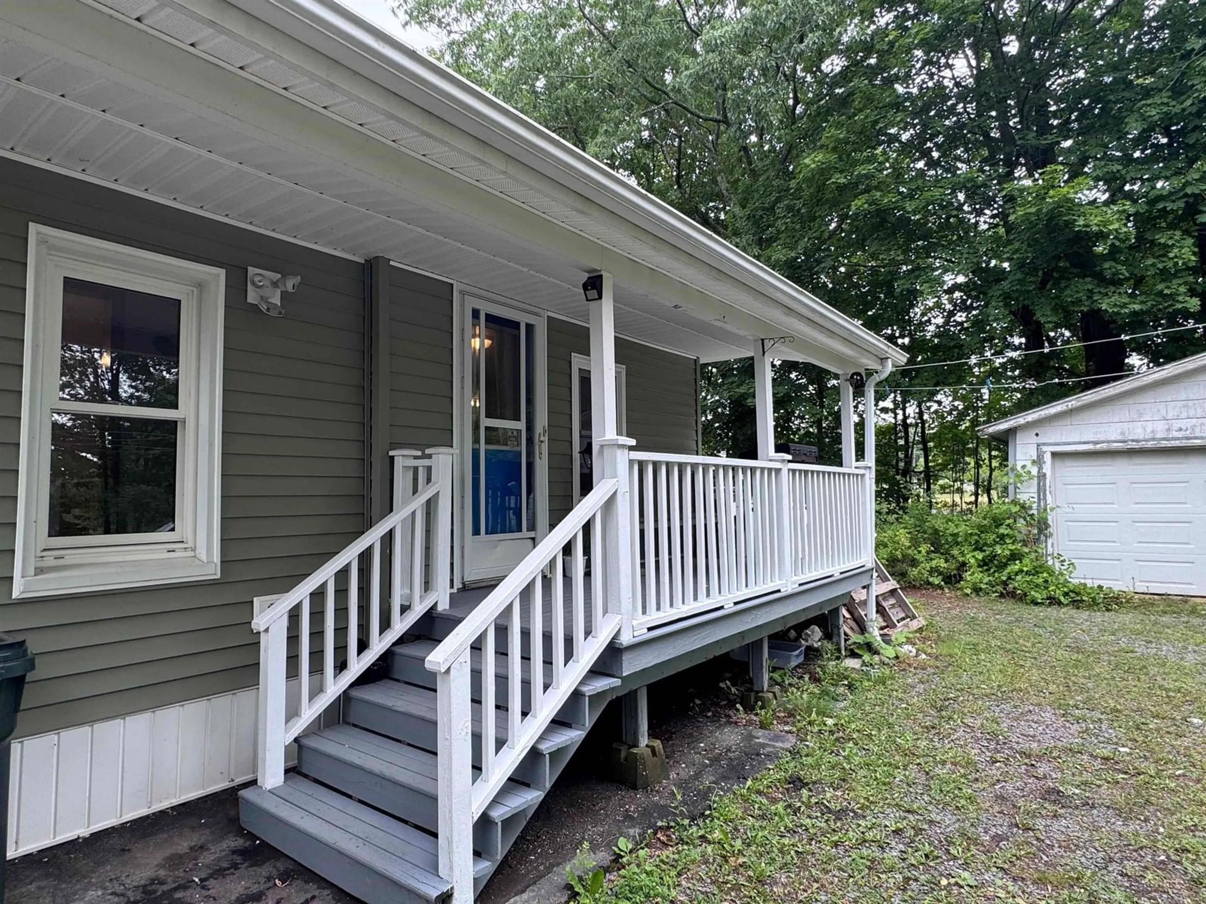 Home with vinyl exterior material, street for 2105 Highway 2, Milford Nova Scotia B0N 1Y0