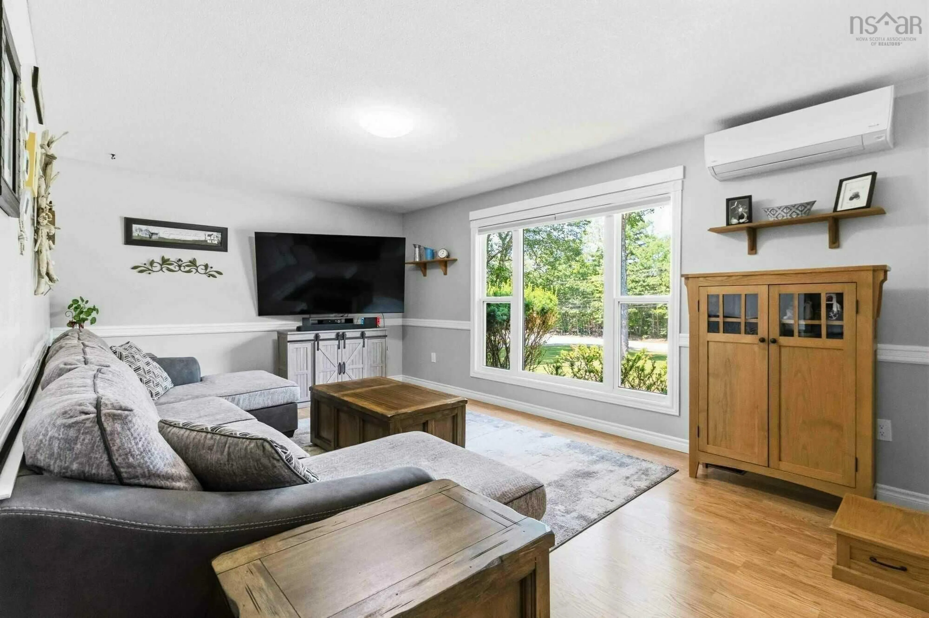 Living room with furniture, wood/laminate floor for 1752 Barss Corner Rd, Scarsdale Nova Scotia B0R 1A0