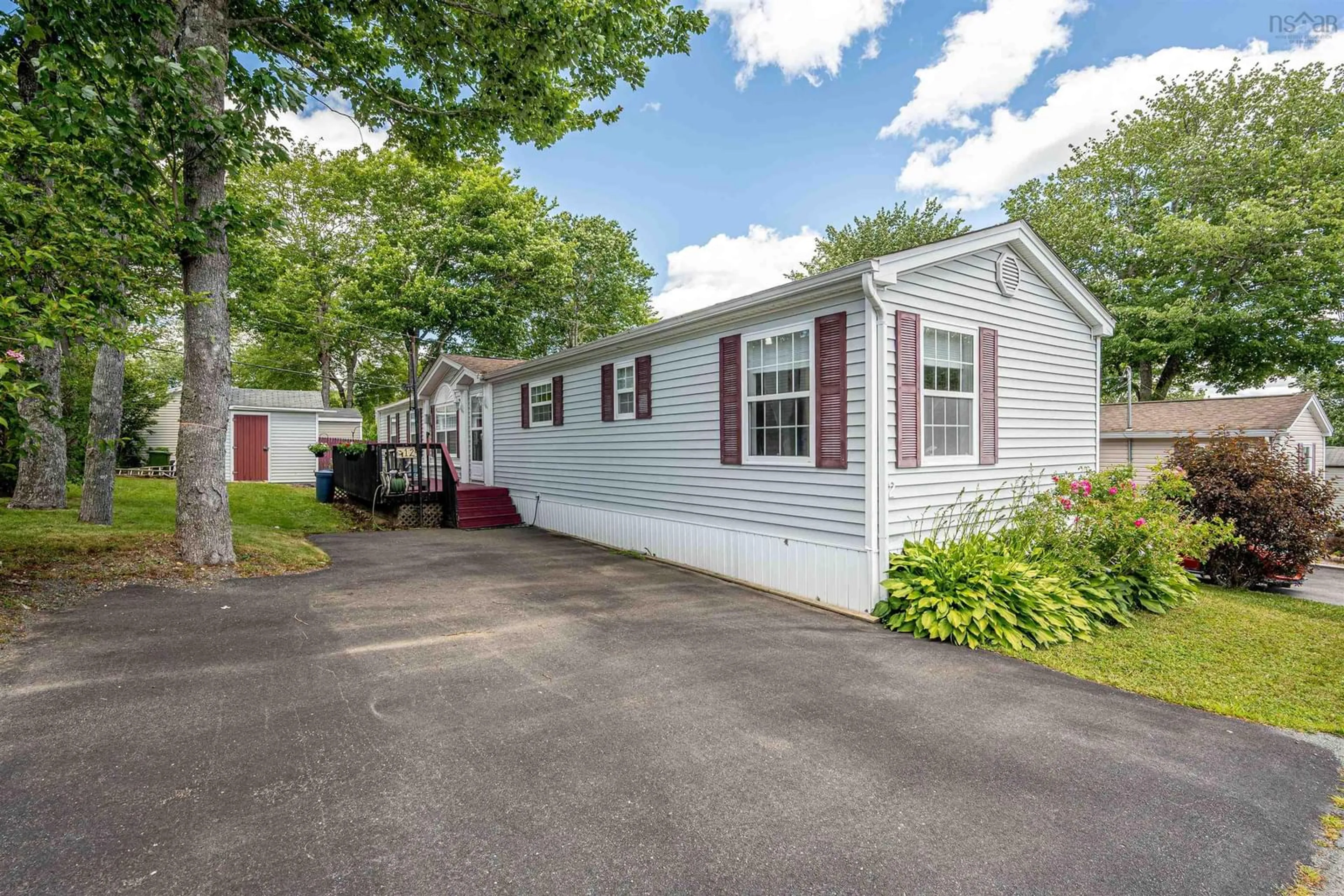 Home with vinyl exterior material, street for 12 Sixth St, Lucasville Nova Scotia B4B 1R3