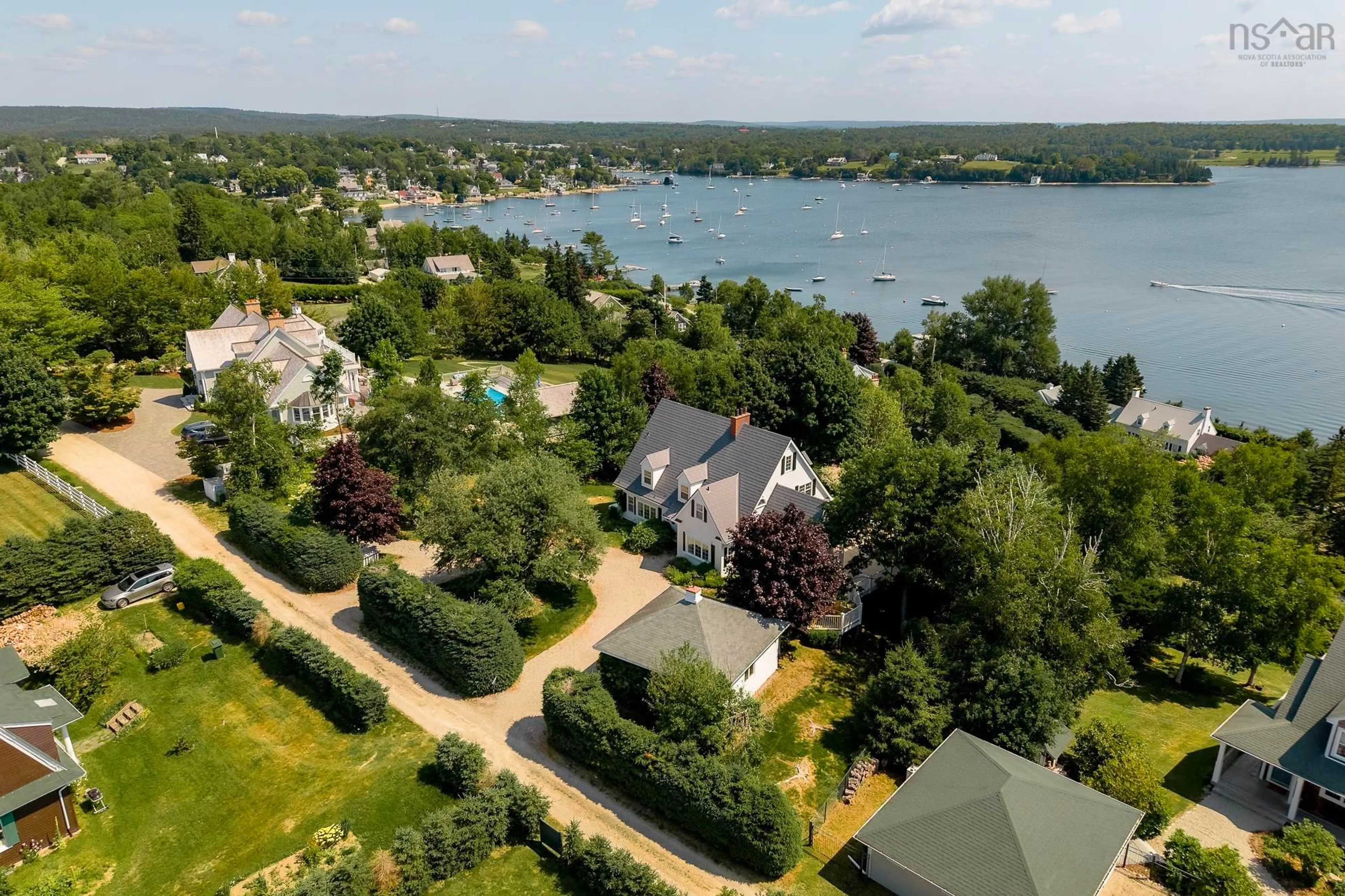 A pic from outside/outdoor area/front of a property/back of a property/a pic from drone, water/lake/river/ocean view for 20 Fredas Point Exten, Chester Nova Scotia B0J 1J0