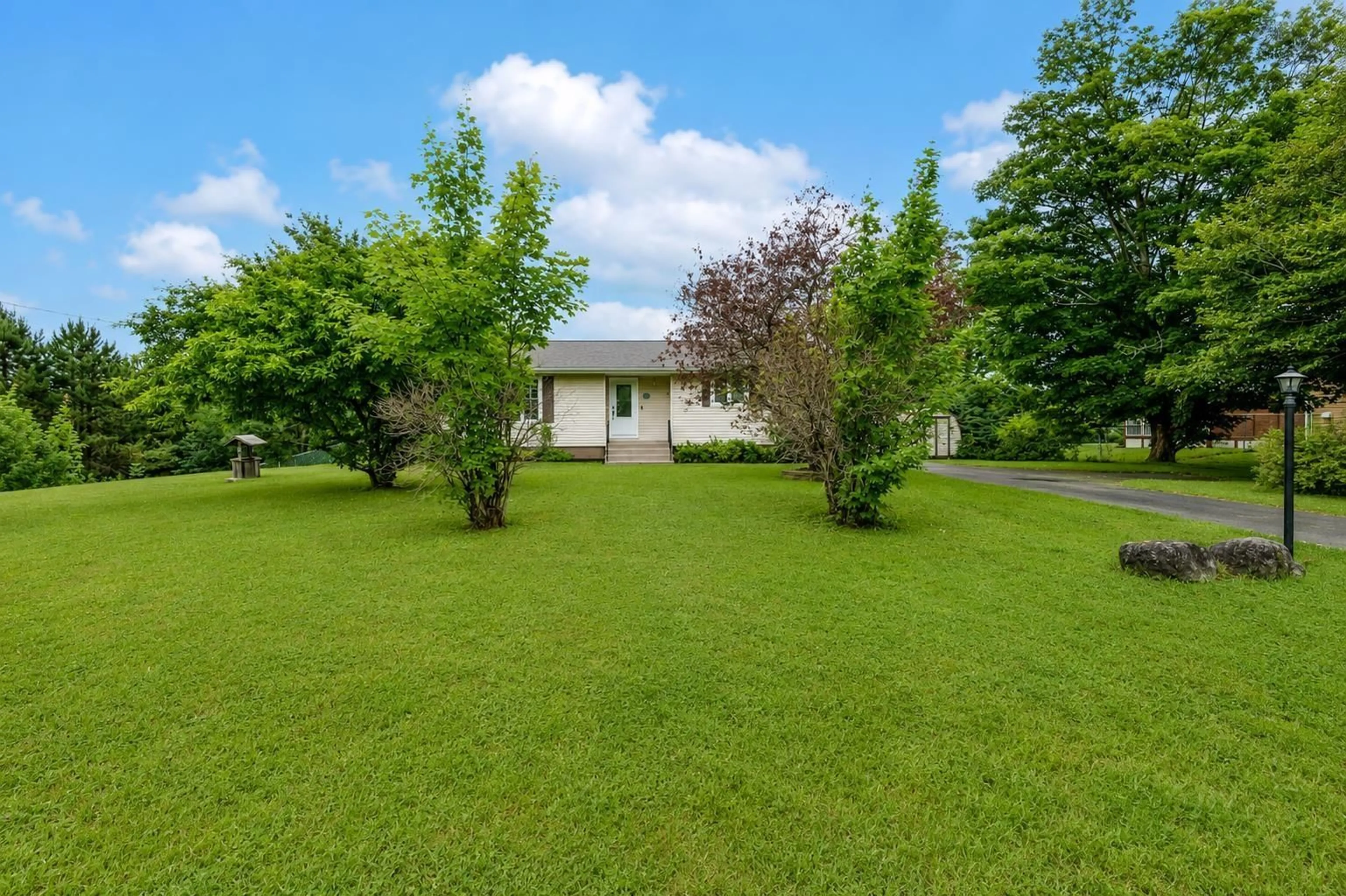 A pic from outside/outdoor area/front of a property/back of a property/a pic from drone, unknown for 76 Tometary Dr, Howie Centre Nova Scotia B1L 1G3