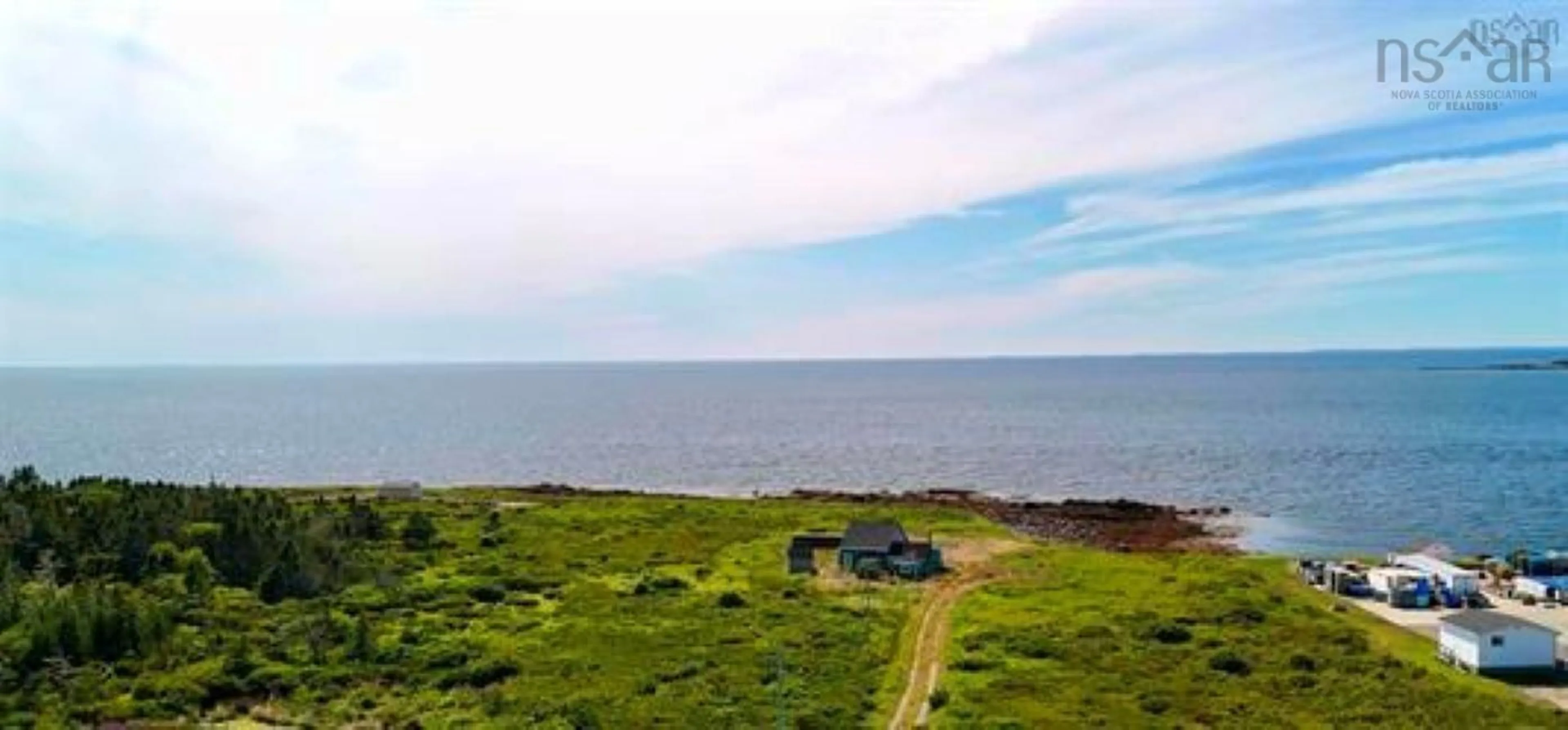 A pic from outside/outdoor area/front of a property/back of a property/a pic from drone, water/lake/river/ocean view for 8581 Highway 3, Charlesville Nova Scotia B0W 2A0