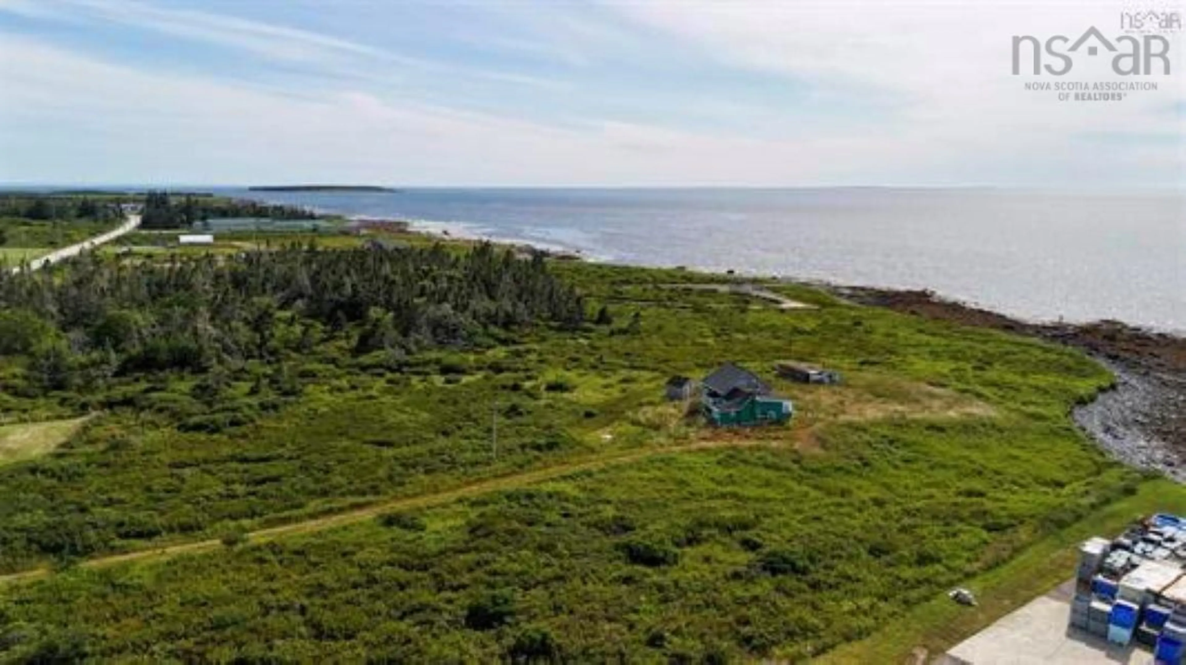 A pic from outside/outdoor area/front of a property/back of a property/a pic from drone, water/lake/river/ocean view for 8581 Highway 3, Charlesville Nova Scotia B0W 2A0