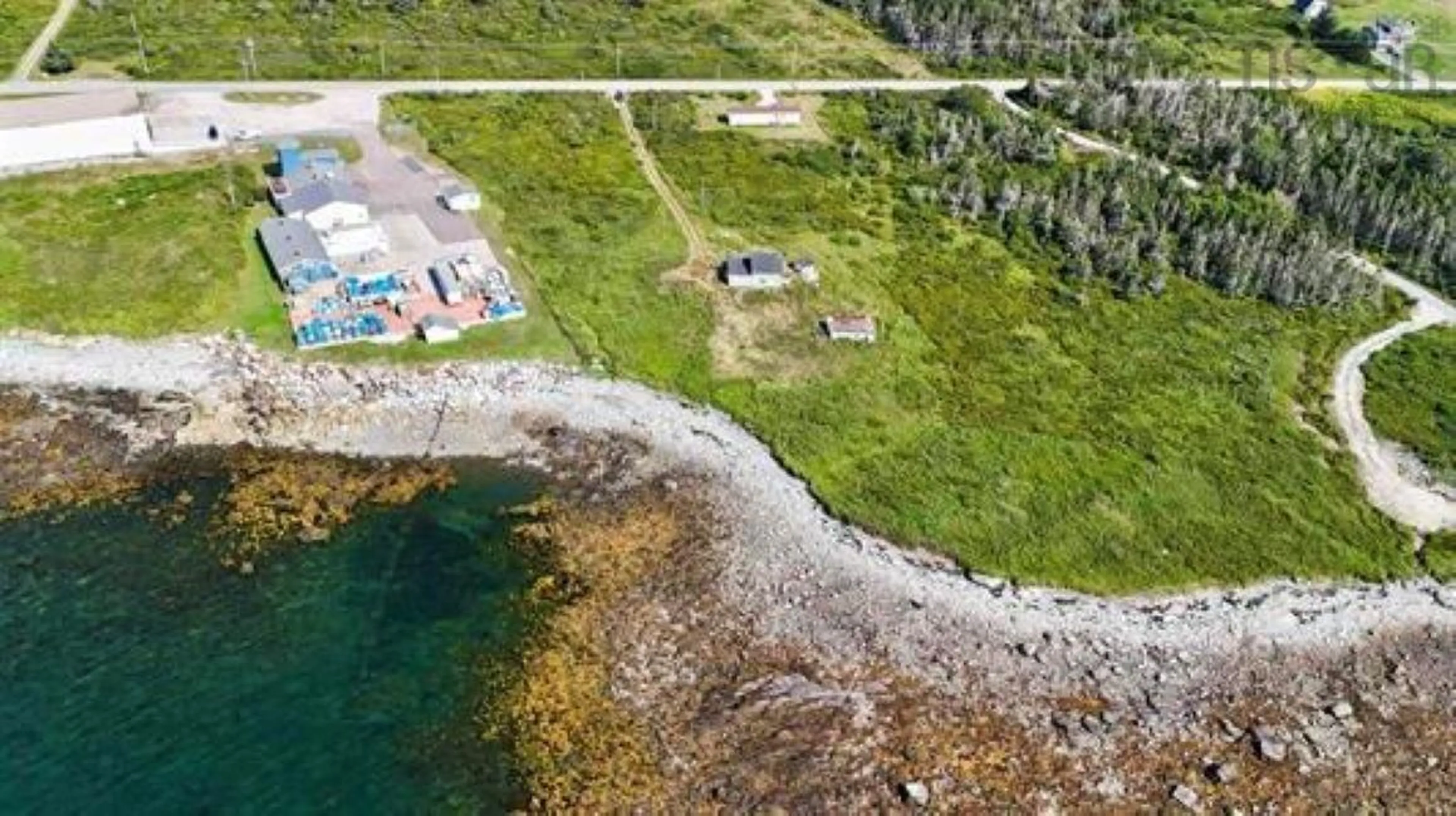 A pic from outside/outdoor area/front of a property/back of a property/a pic from drone, water/lake/river/ocean view for 8581 Highway 3, Charlesville Nova Scotia B0W 2A0