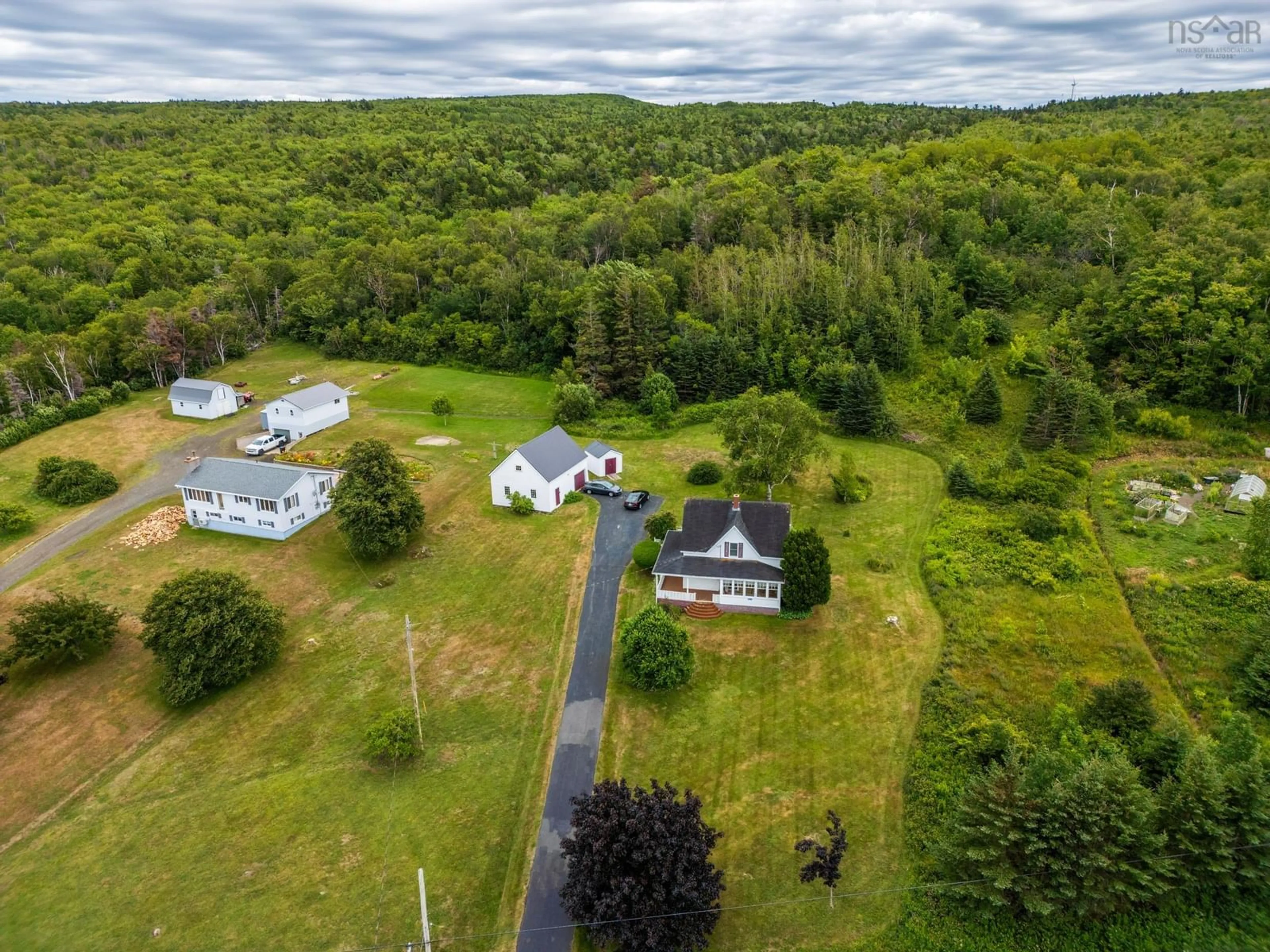 A pic from outside/outdoor area/front of a property/back of a property/a pic from drone, unknown for 4834 Shore Rd, Parkers Cove Nova Scotia B0S 1A0