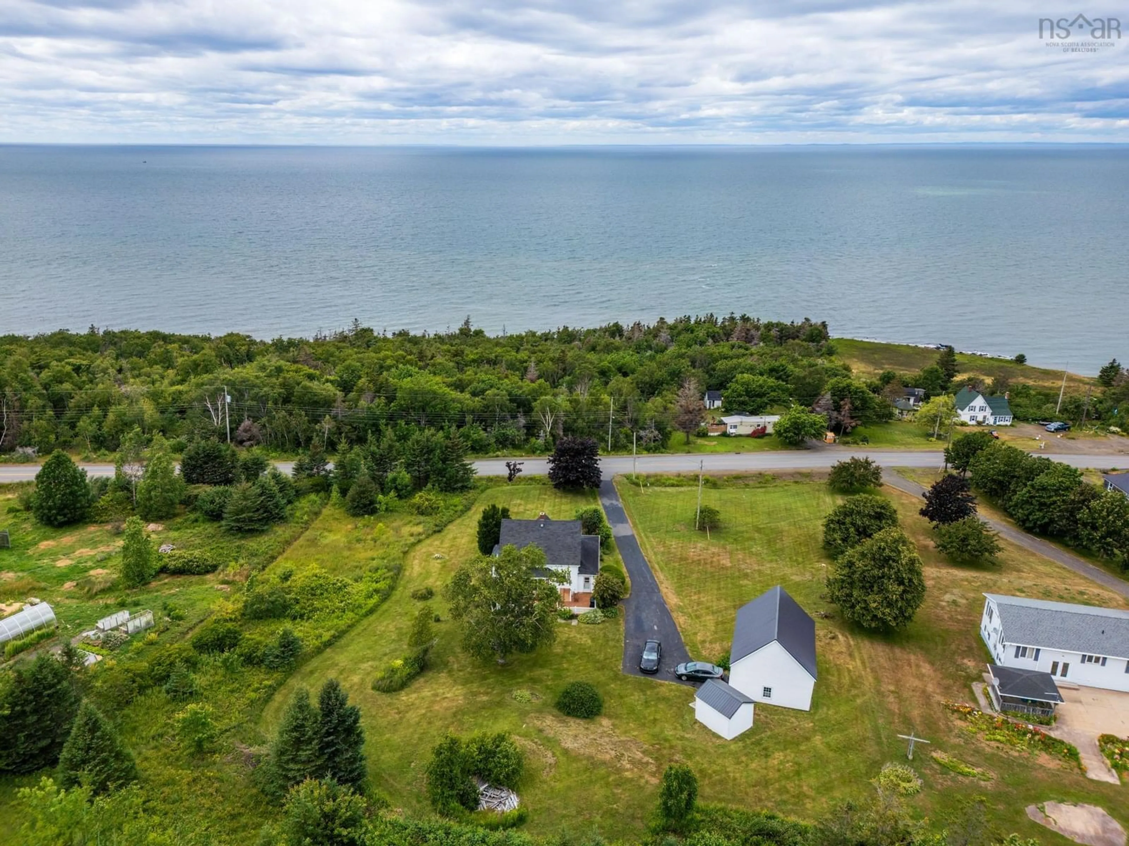 A pic from outside/outdoor area/front of a property/back of a property/a pic from drone, water/lake/river/ocean view for 4834 Shore Rd, Parkers Cove Nova Scotia B0S 1A0