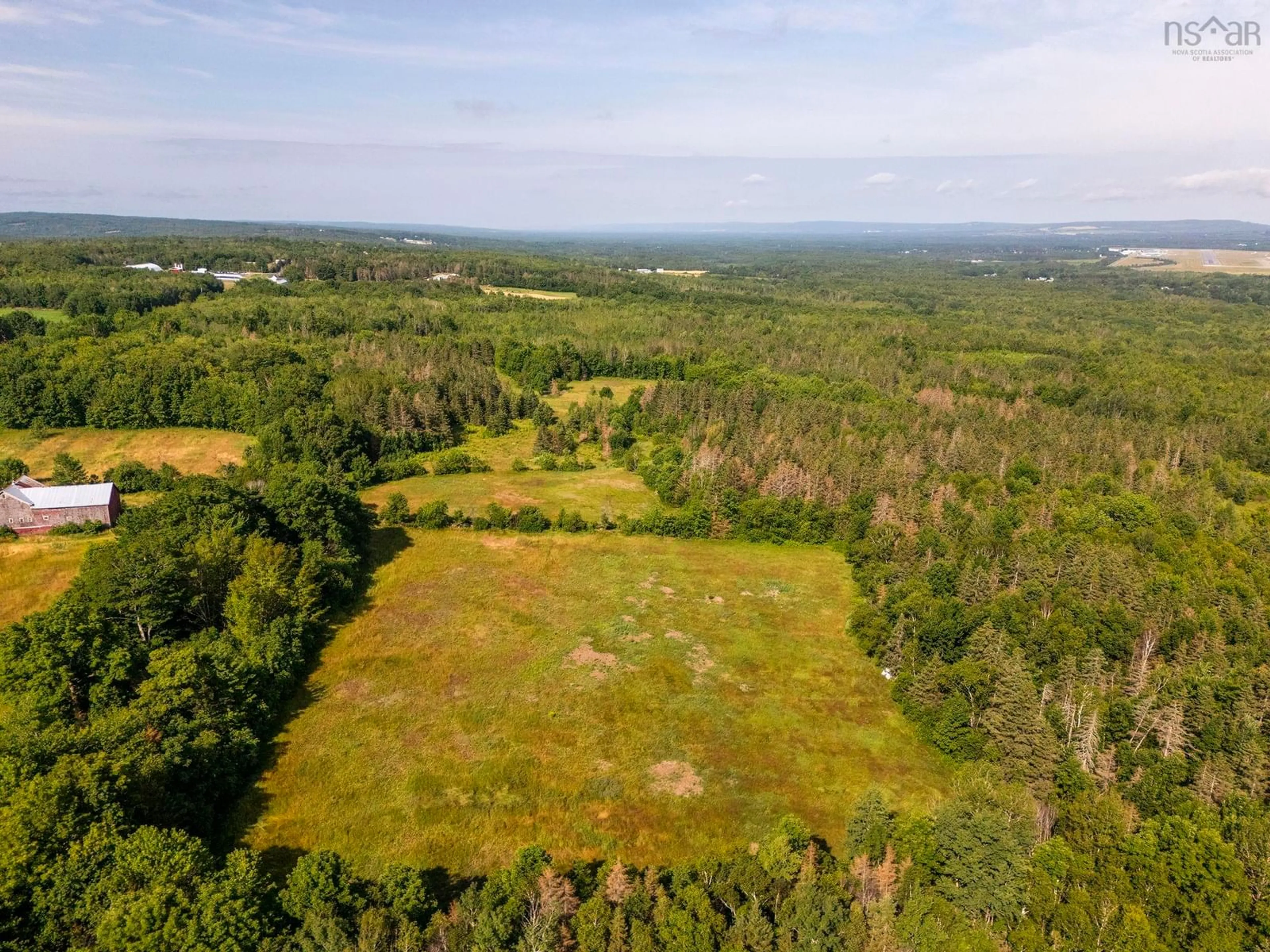 A pic from outside/outdoor area/front of a property/back of a property/a pic from drone, forest/trees view for 1309 Harmony Rd, Harmony Nova Scotia B0P 1R0