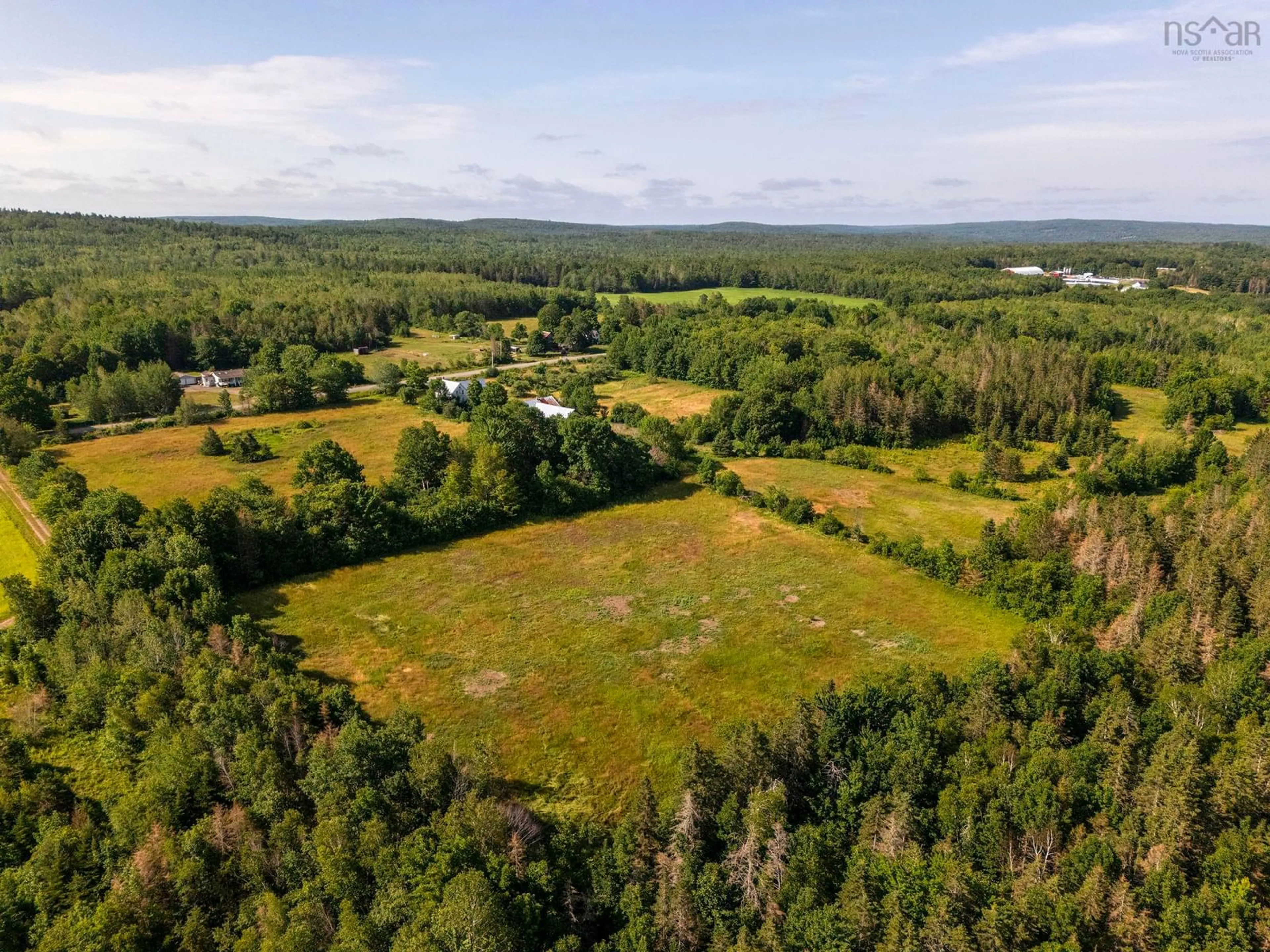 A pic from outside/outdoor area/front of a property/back of a property/a pic from drone, forest/trees view for 1309 Harmony Rd, Harmony Nova Scotia B0P 1R0