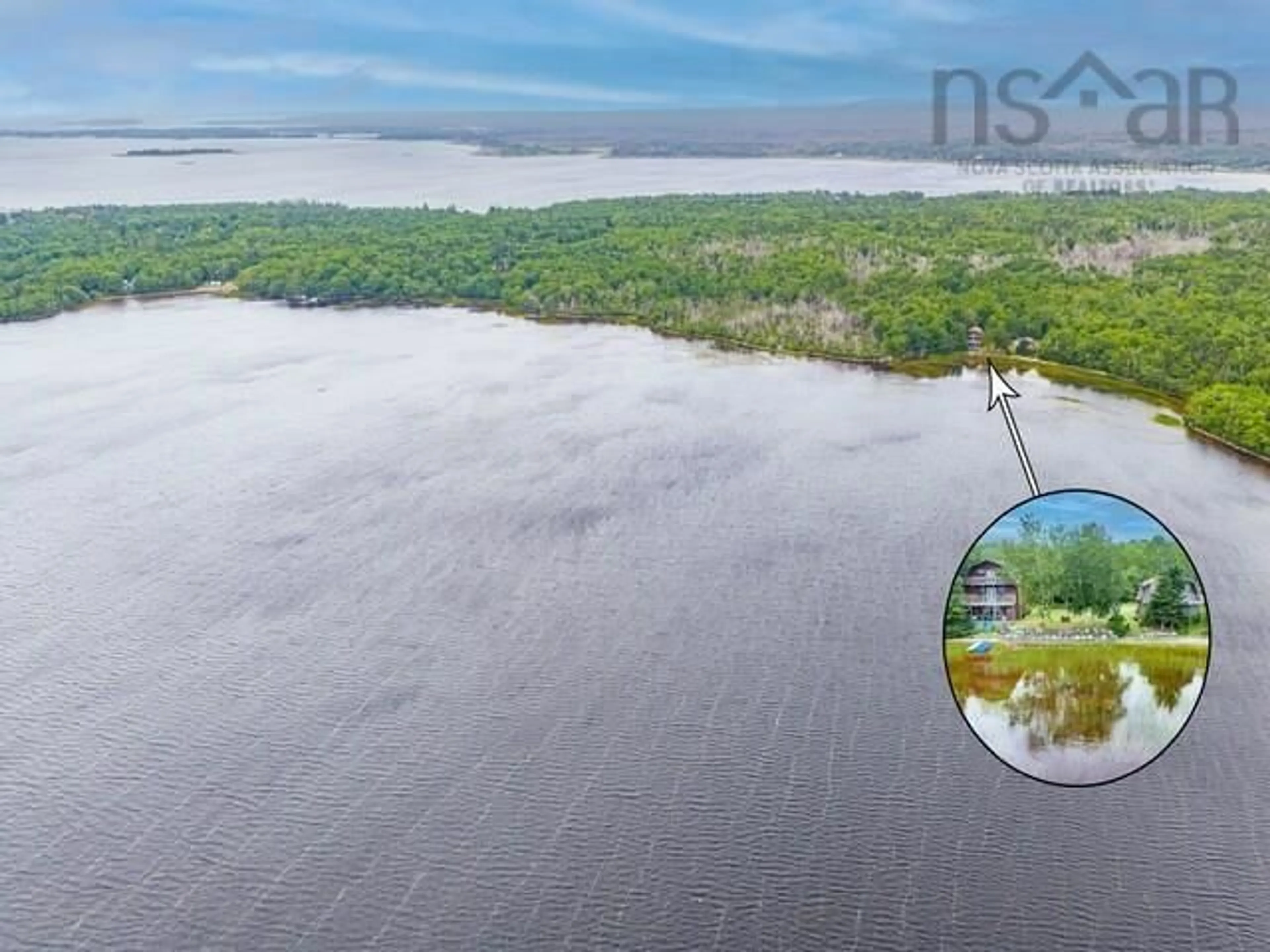 A pic from outside/outdoor area/front of a property/back of a property/a pic from drone, water/lake/river/ocean view for 233 Greenwodd Lake Road, Port Saxon Nova Scotia B0W 2S0