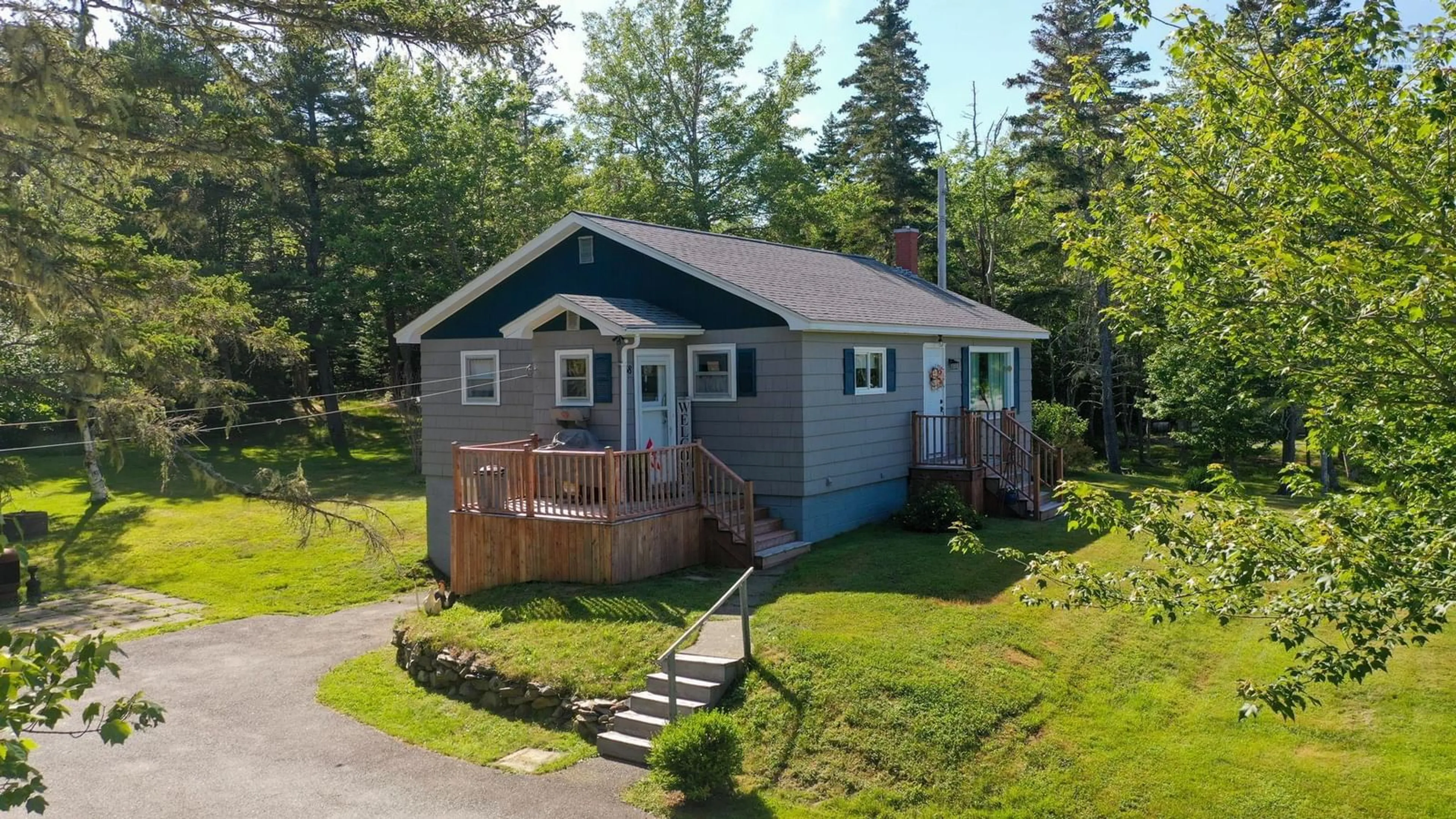 A pic from outside/outdoor area/front of a property/back of a property/a pic from drone, street for 38 White Point 2 Rd, White Point Nova Scotia B0T 1G0