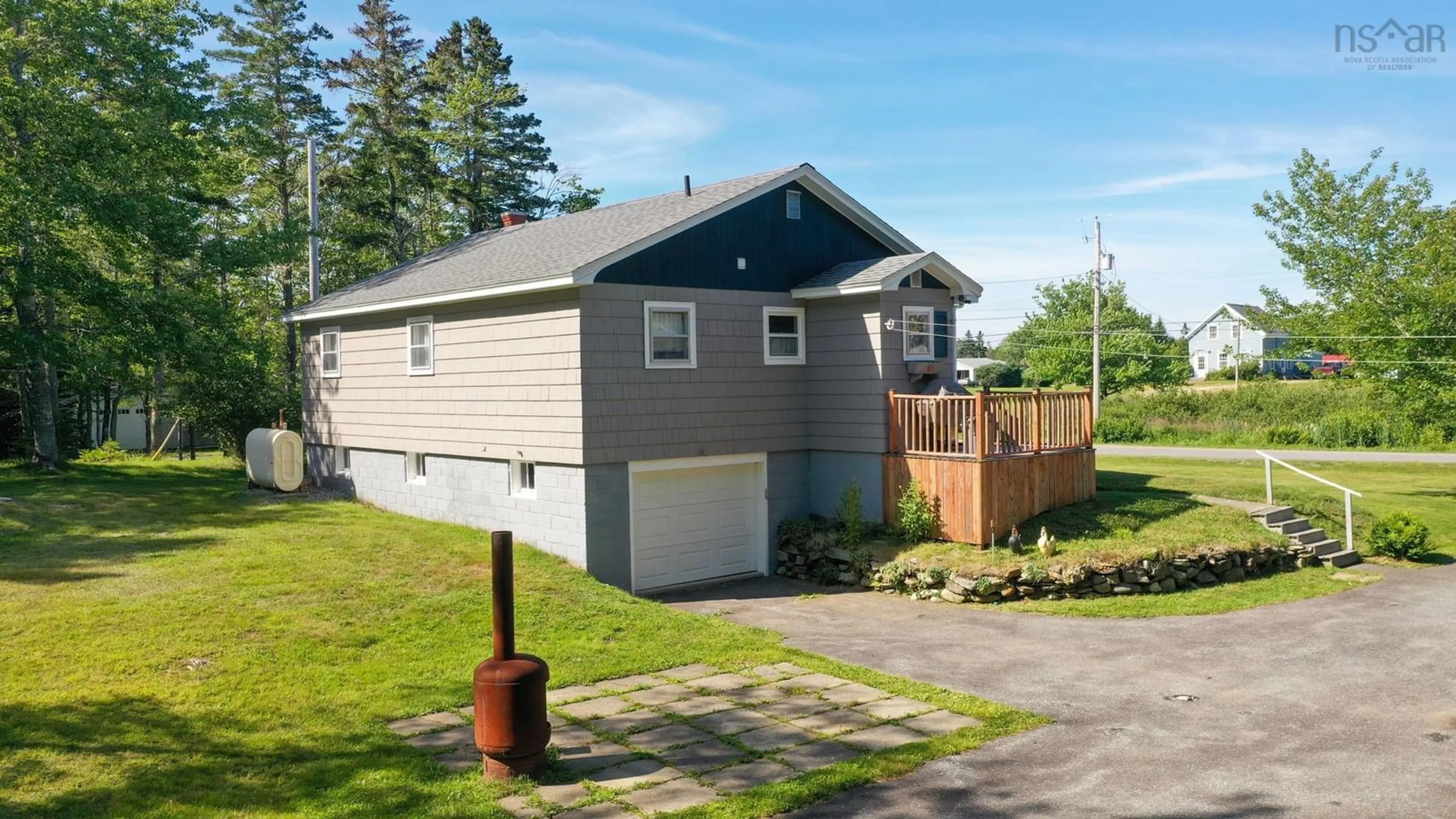 Home with vinyl exterior material, street for 38 White Point 2 Rd, White Point Nova Scotia B0T 1G0