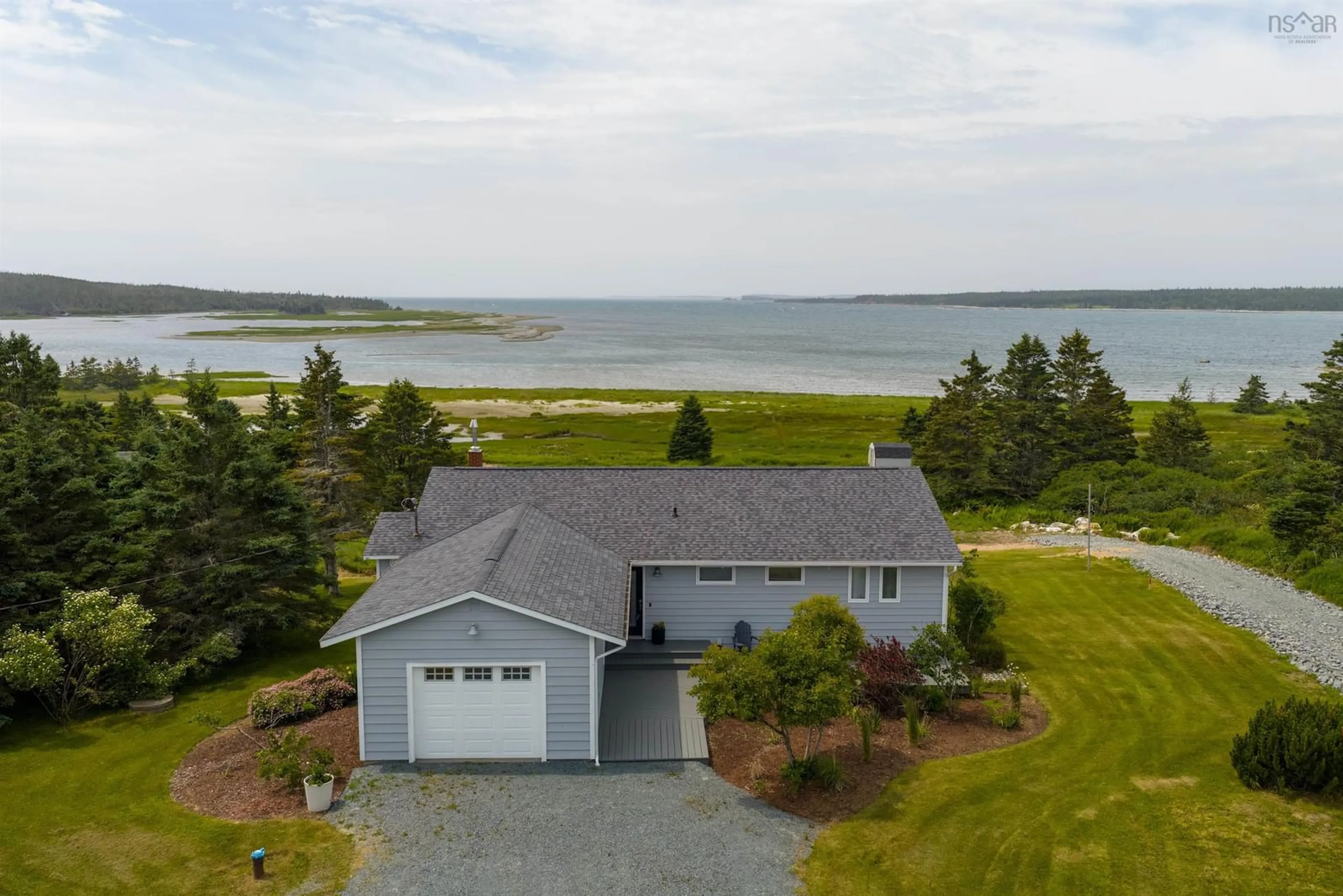 A pic from outside/outdoor area/front of a property/back of a property/a pic from drone, water/lake/river/ocean view for 2160 East Petpeswick Rd, East Petpeswick Nova Scotia B0J 2L0