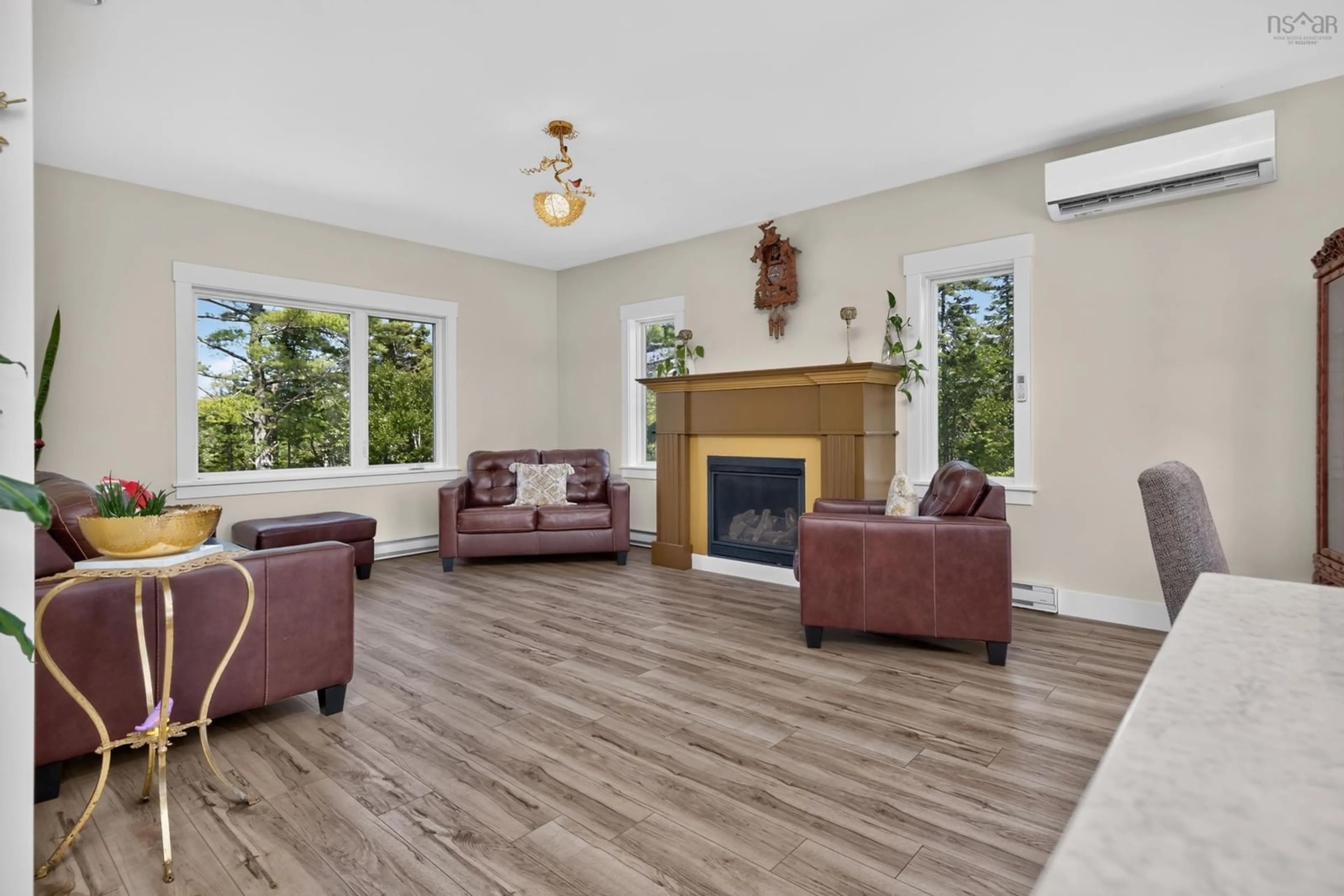 Living room with furniture, wood/laminate floor for 819 Bissett Rd, Cole Harbour Nova Scotia B2V 2T8