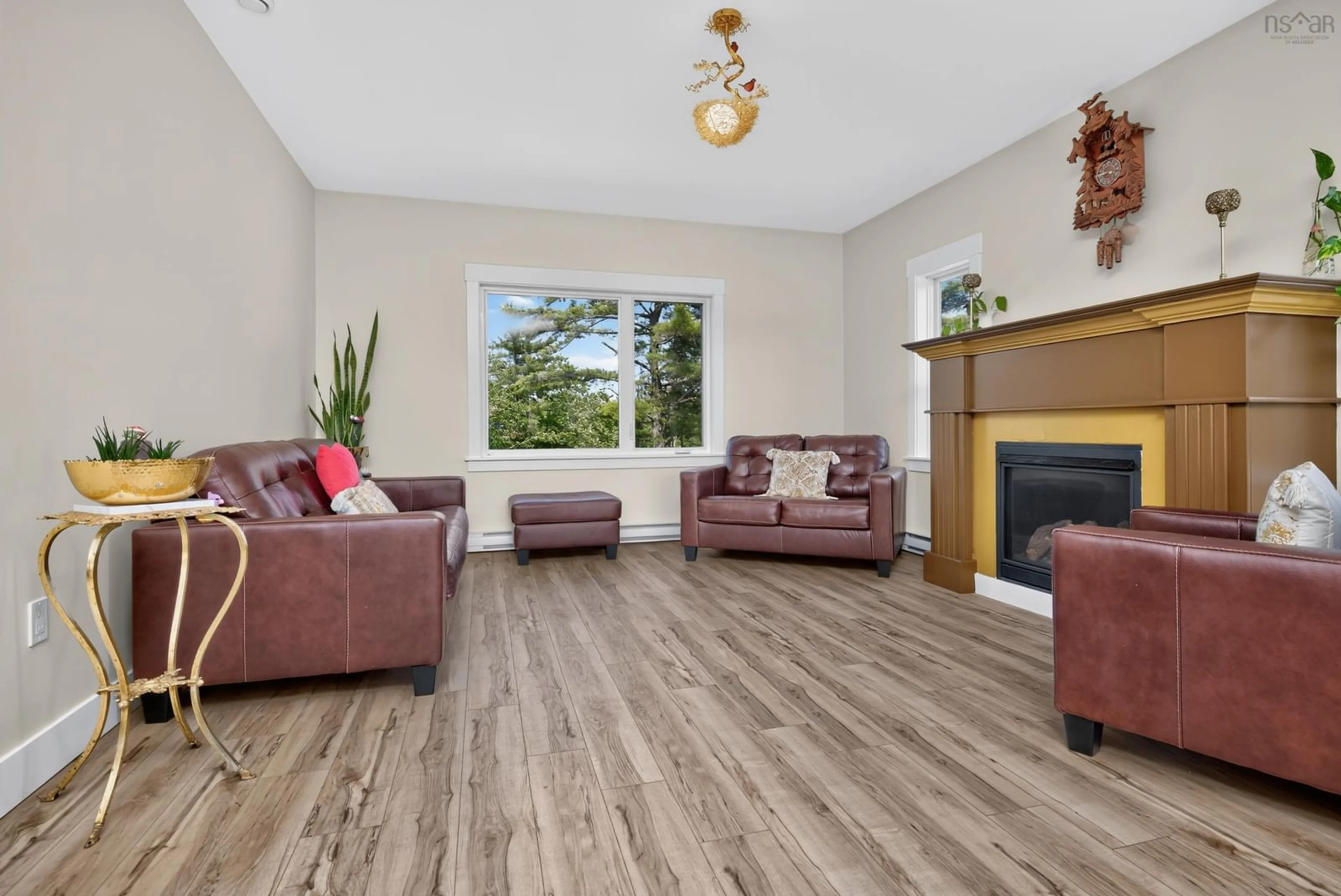 Living room with furniture, wood/laminate floor for 819 Bissett Rd, Cole Harbour Nova Scotia B2V 2T8