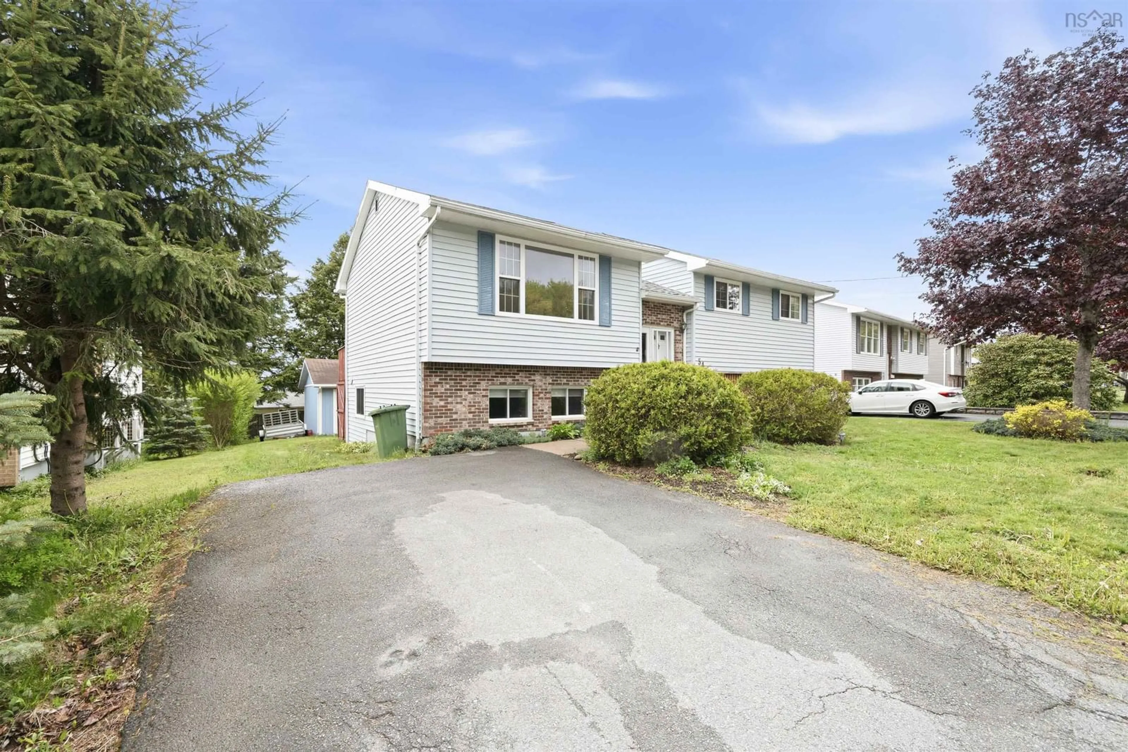 Home with vinyl exterior material, street for 54 Cartier Cres, Lower Sackville Nova Scotia B4C 3K7