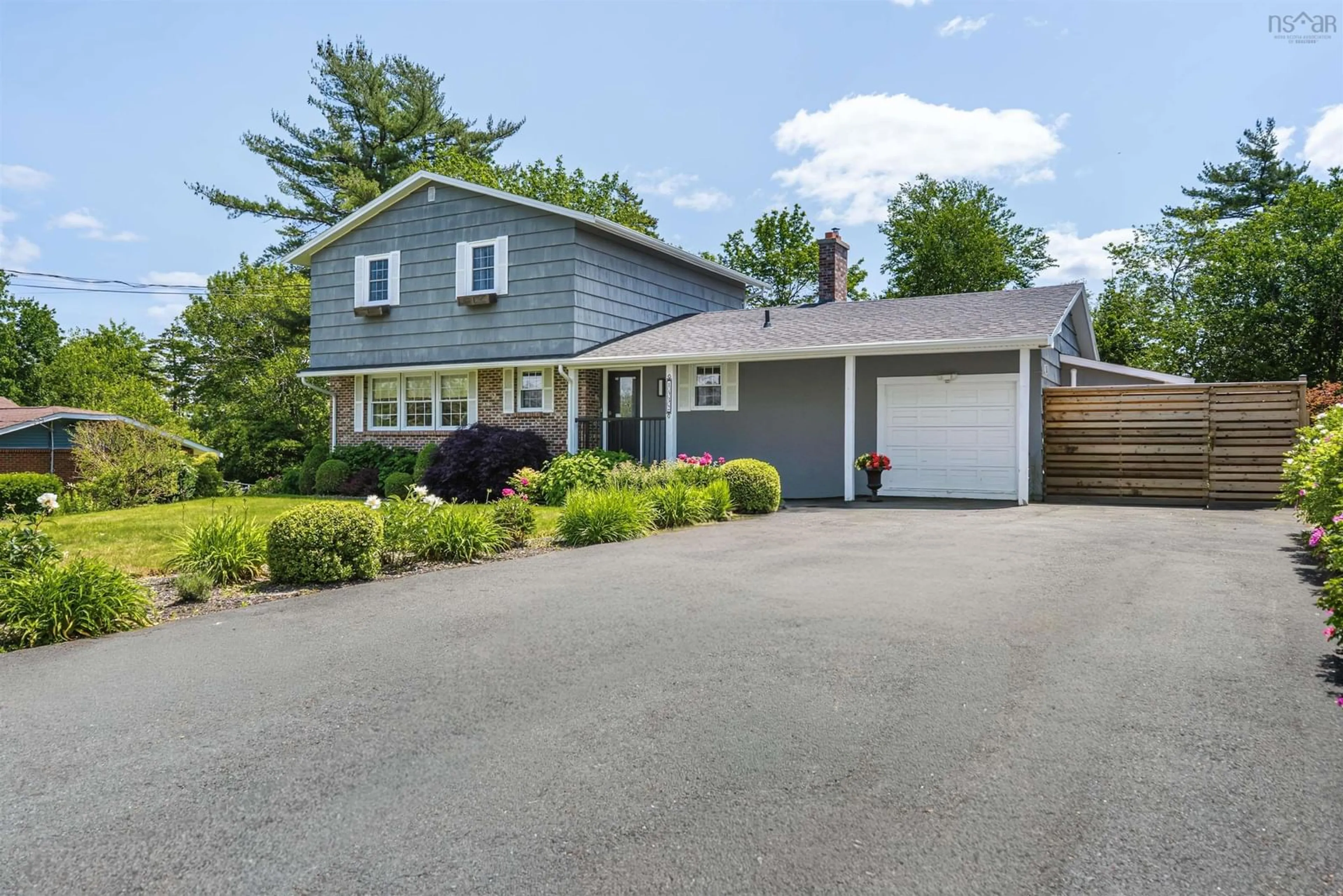 Home with vinyl exterior material, street for 1432 Lucasville Rd, Hammonds Plains Nova Scotia B4B 1P7