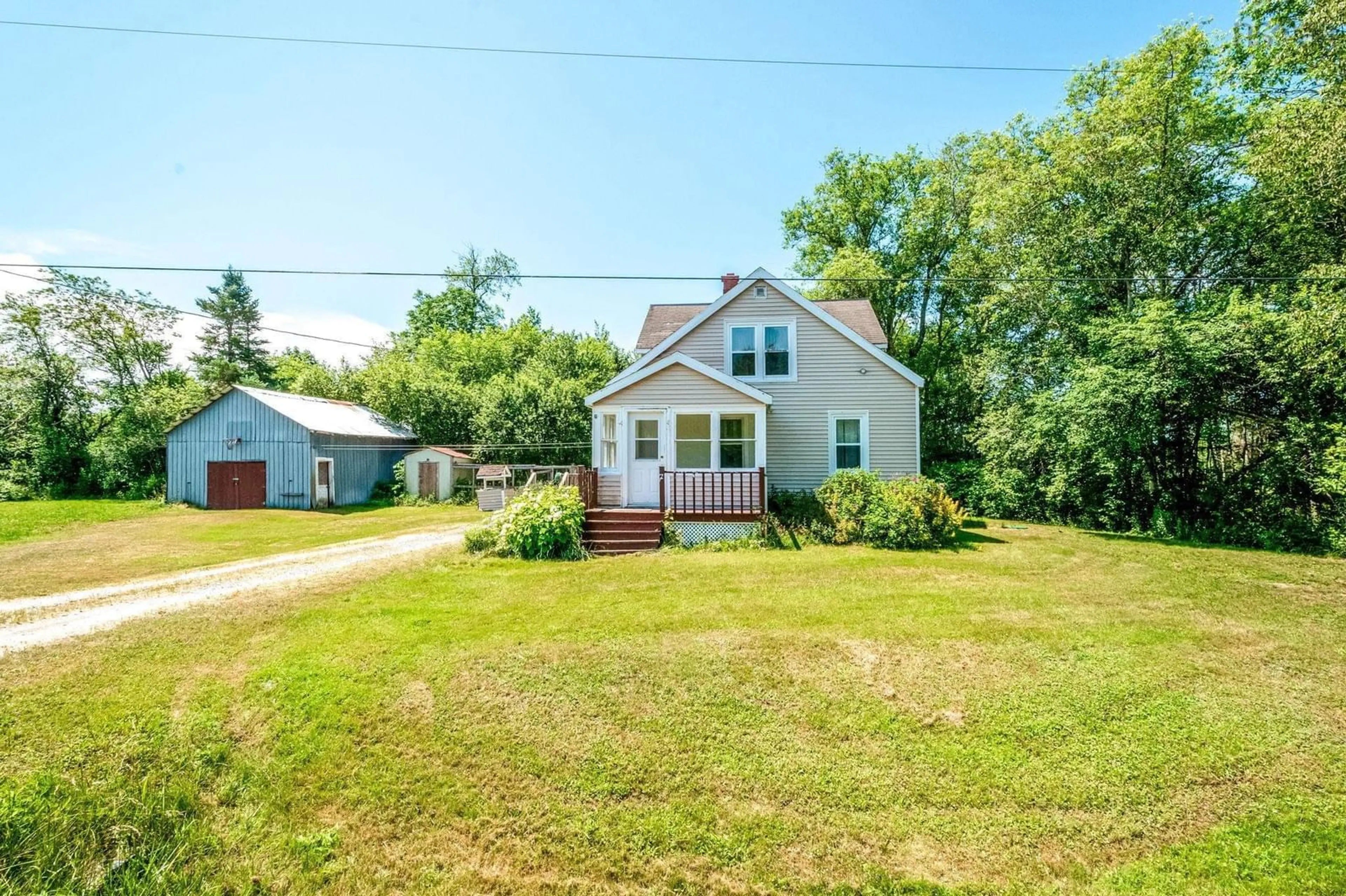 A pic from outside/outdoor area/front of a property/back of a property/a pic from drone, street for 86 Meadowvale Rd, South Branch Nova Scotia B0N 2P0