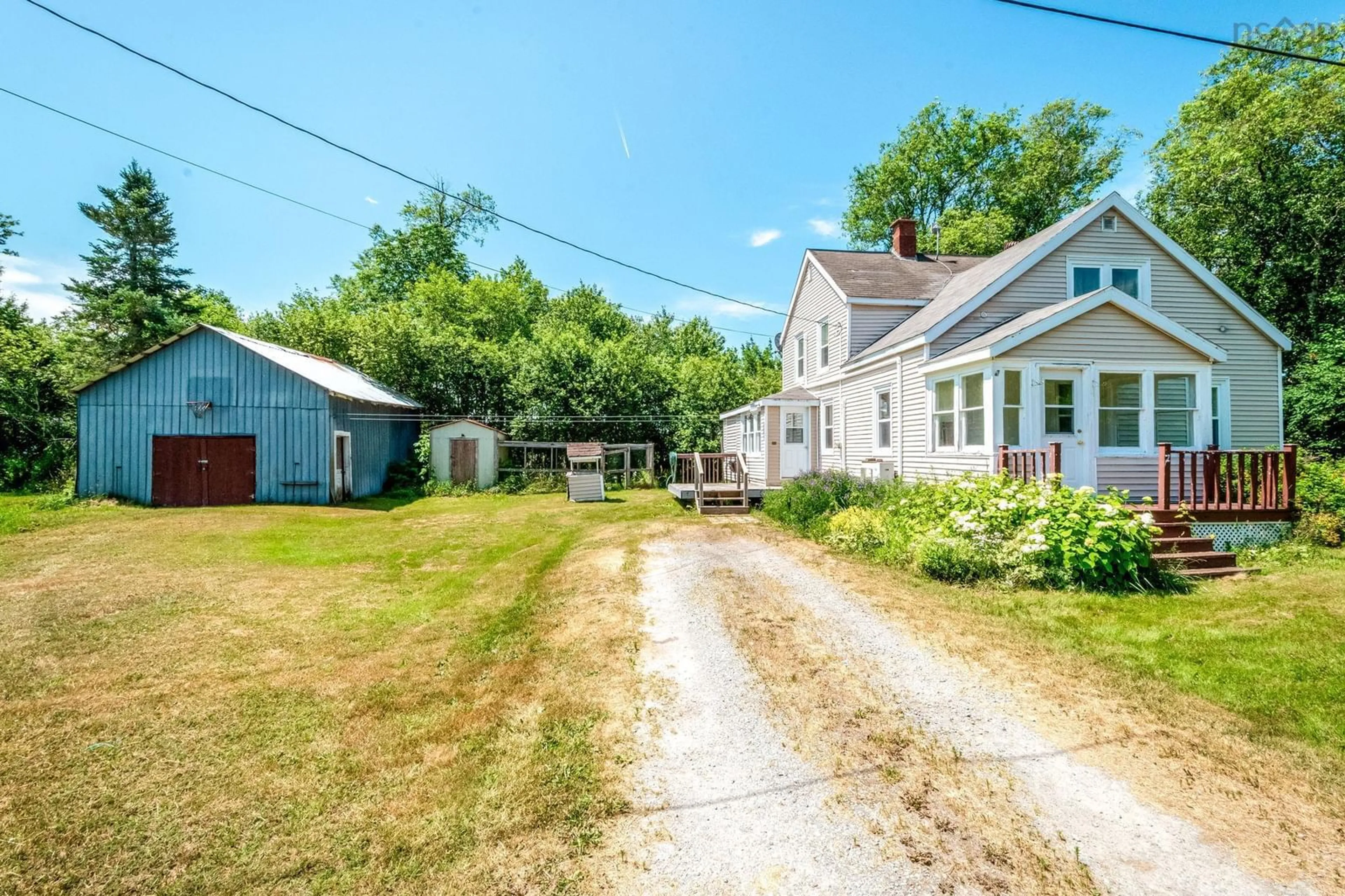 A pic from outside/outdoor area/front of a property/back of a property/a pic from drone, street for 86 Meadowvale Rd, South Branch Nova Scotia B0N 2P0