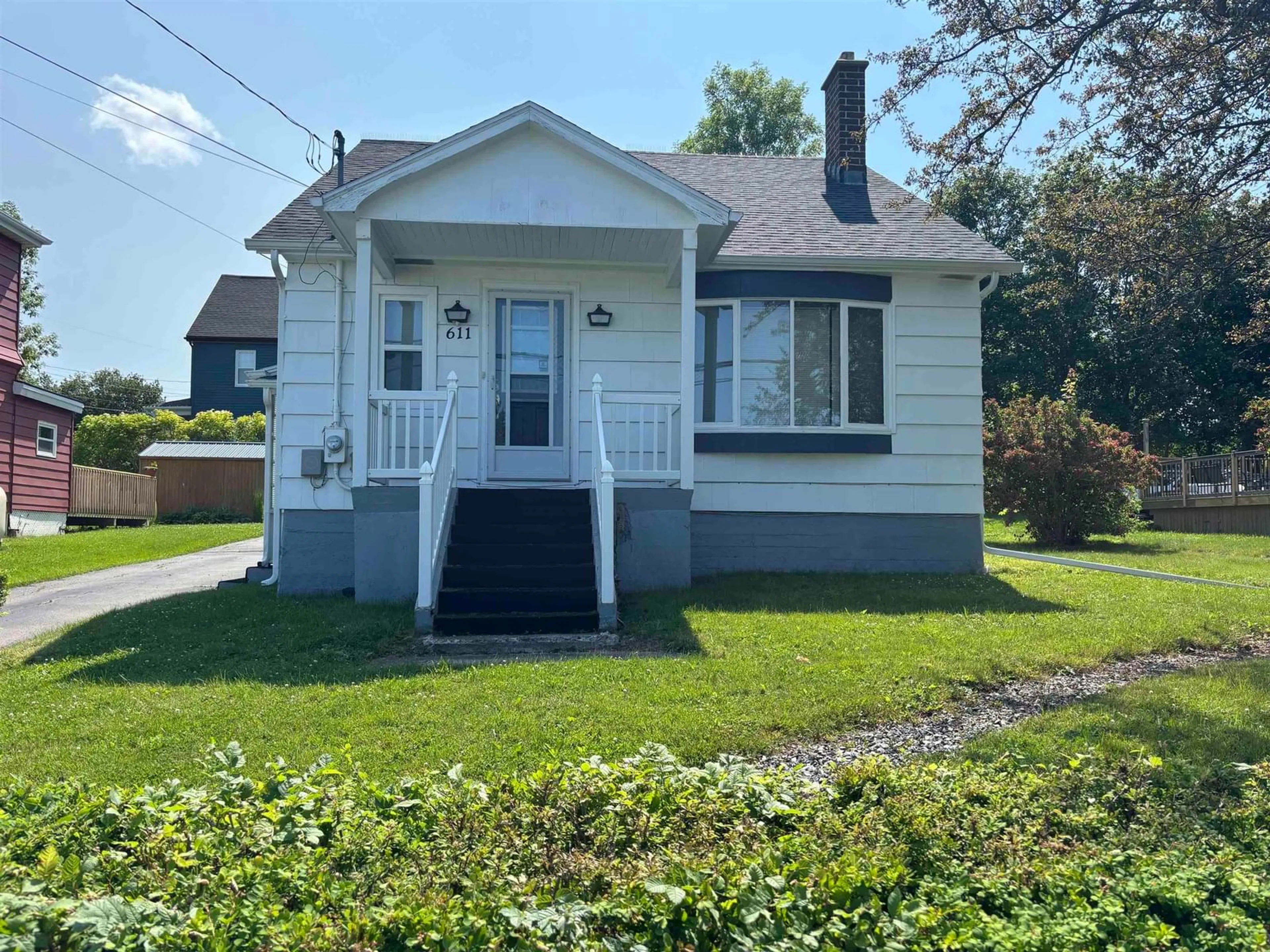 Home with vinyl exterior material, street for 611 Main St, Sydney Mines Nova Scotia B1V 2L1