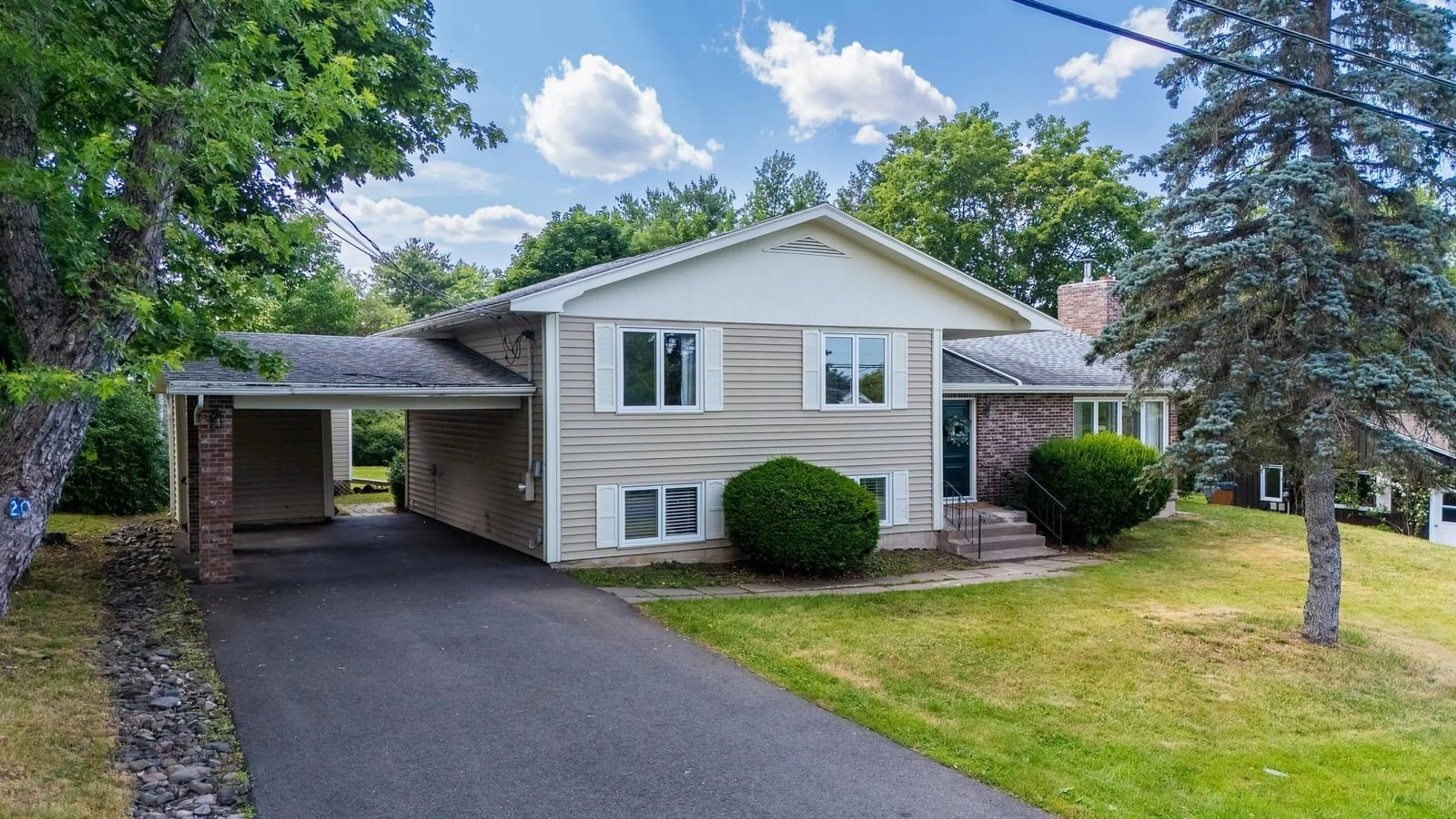 Home with vinyl exterior material, street for 20 Grandview Dr, Wolfville Nova Scotia B4P 1W4