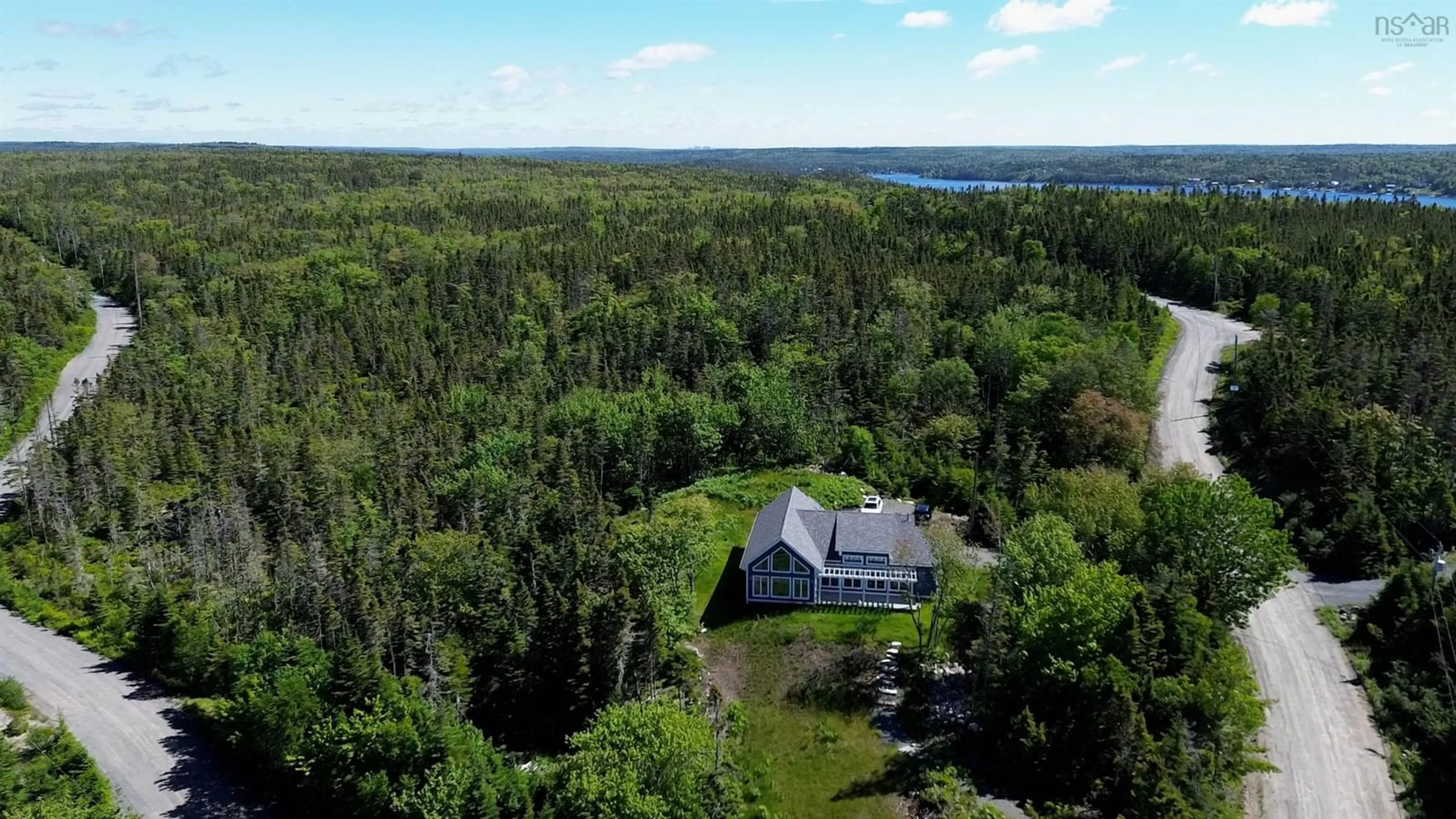 A pic from outside/outdoor area/front of a property/back of a property/a pic from drone, water/lake/river/ocean view for 667 Shad Point Pky, Blind Bay Nova Scotia B3Z 4C1