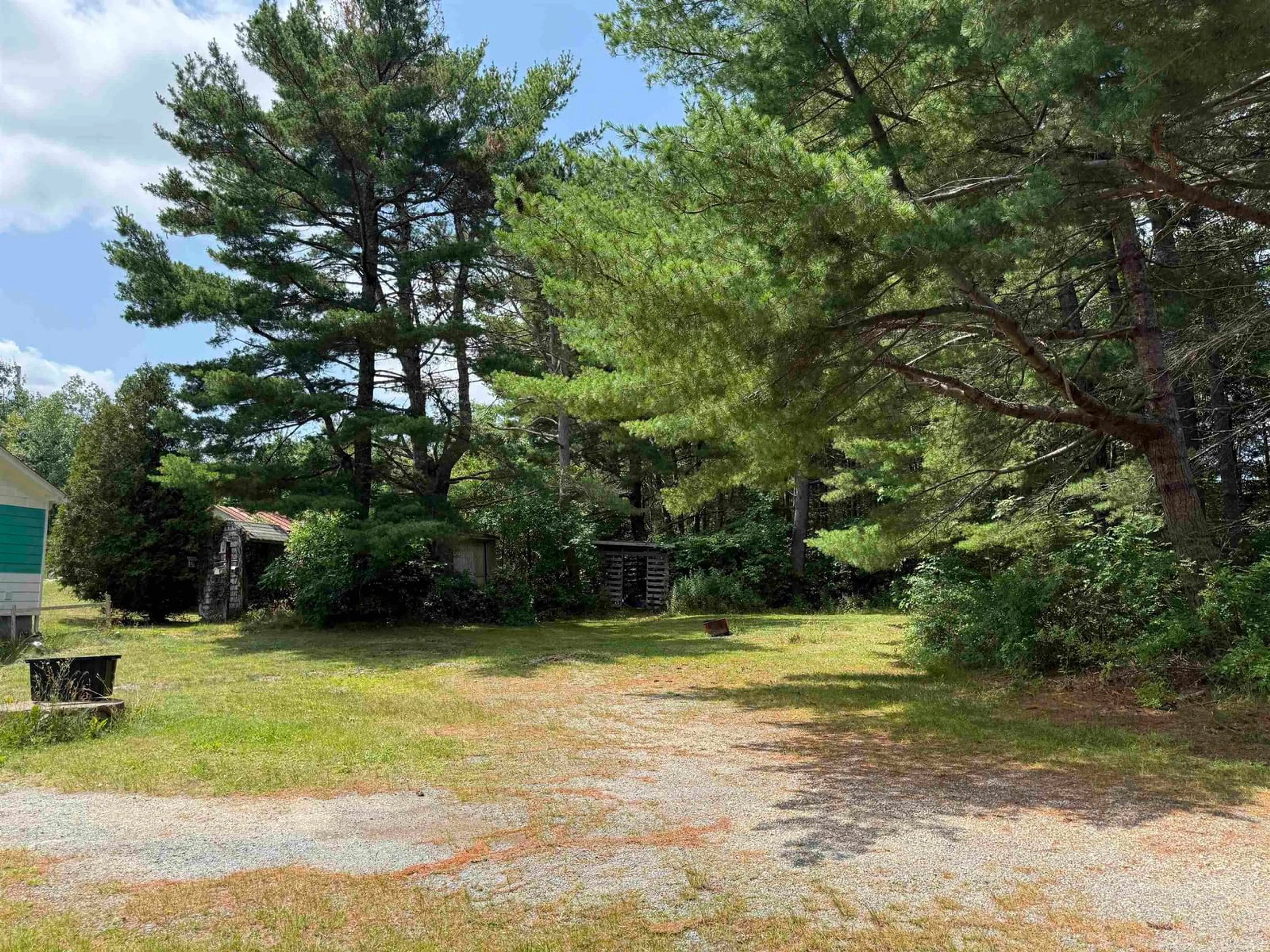 A pic from outside/outdoor area/front of a property/back of a property/a pic from drone, forest/trees view for 42 Station Road Extension, Western Shore Nova Scotia B0J 3M0