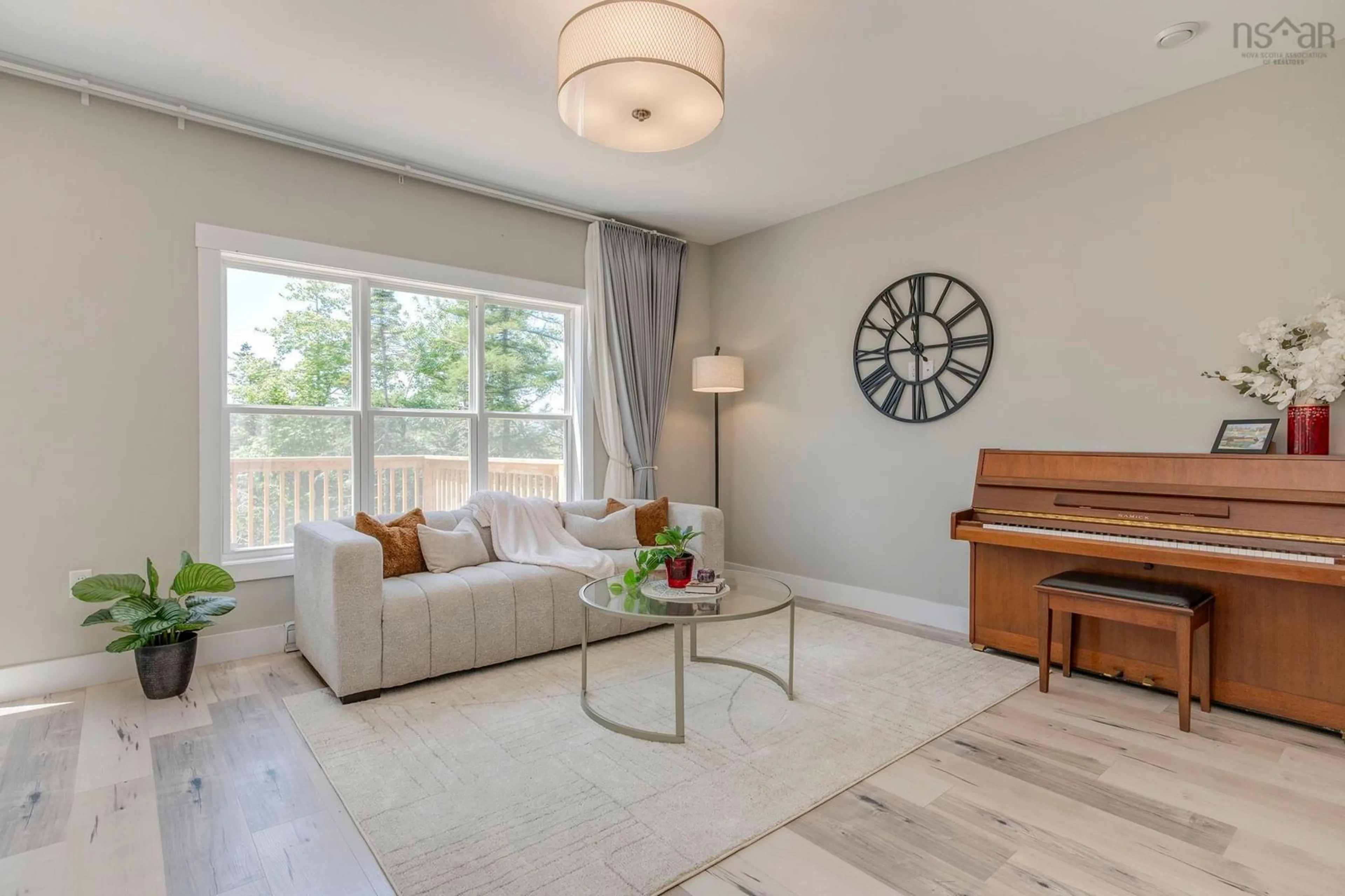 Living room with furniture, wood/laminate floor for 60 Higgins Ave, Beechville Nova Scotia B3T 0M4