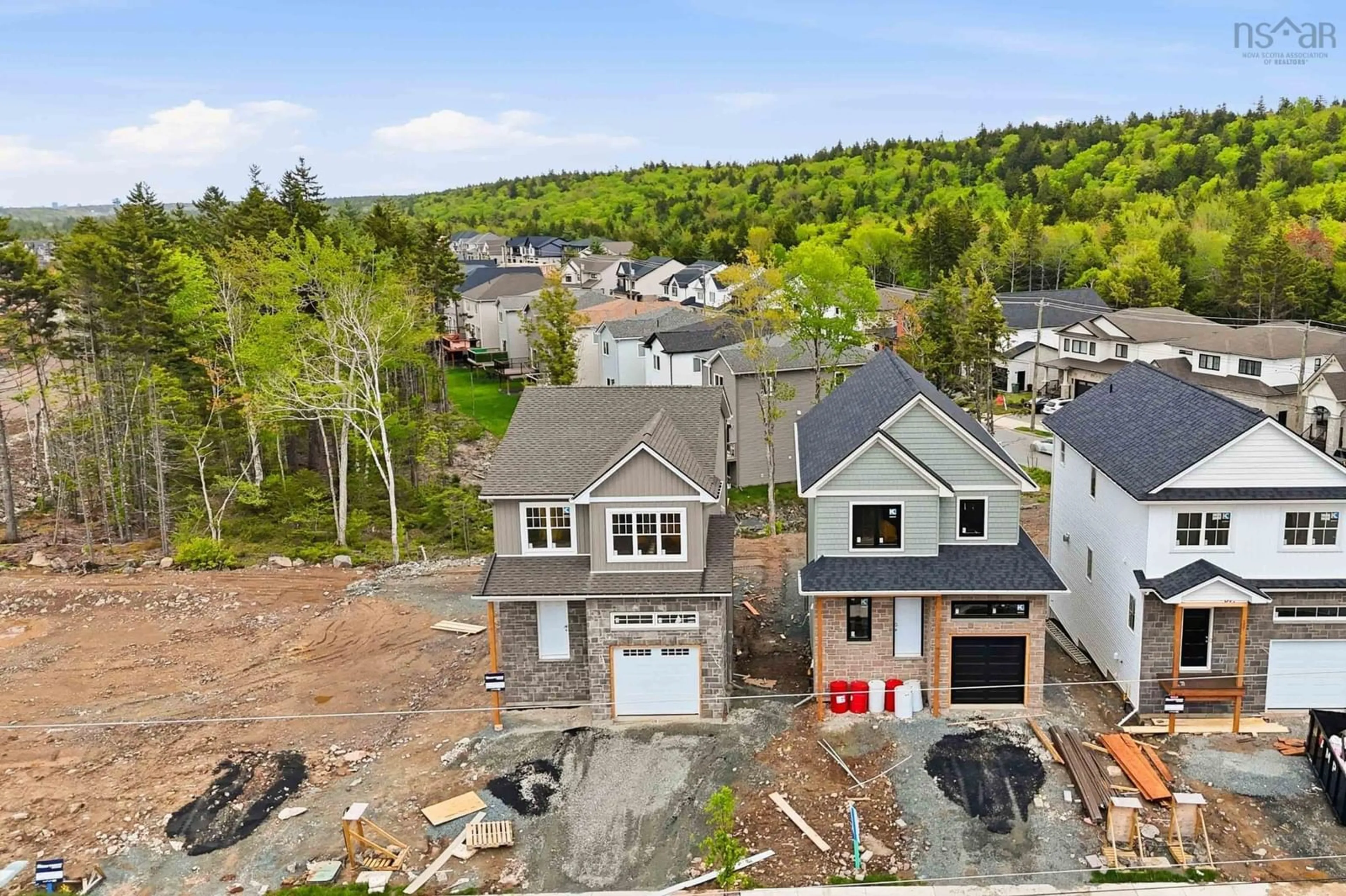 A pic from outside/outdoor area/front of a property/back of a property/a pic from drone, unknown for 11 Garvey Crt #GAR-49, Bedford Nova Scotia B4B 2V7