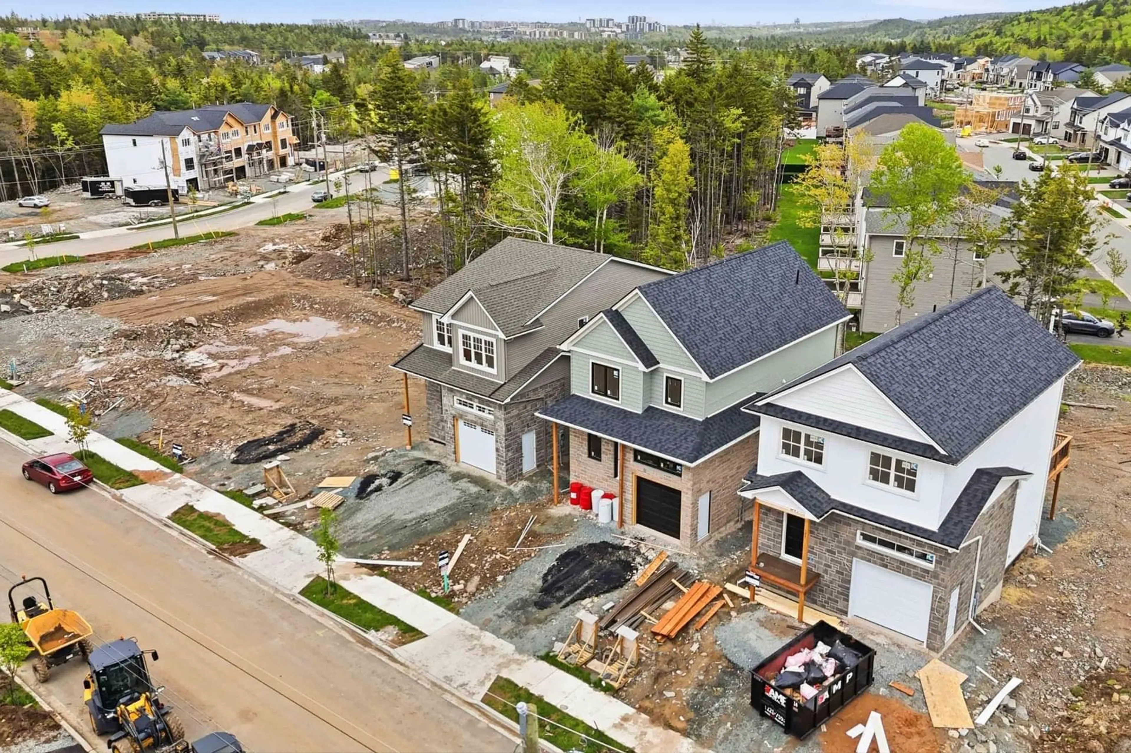 A pic from outside/outdoor area/front of a property/back of a property/a pic from drone, street for 11 Garvey Crt #GAR-49, Bedford Nova Scotia B4B 2V7