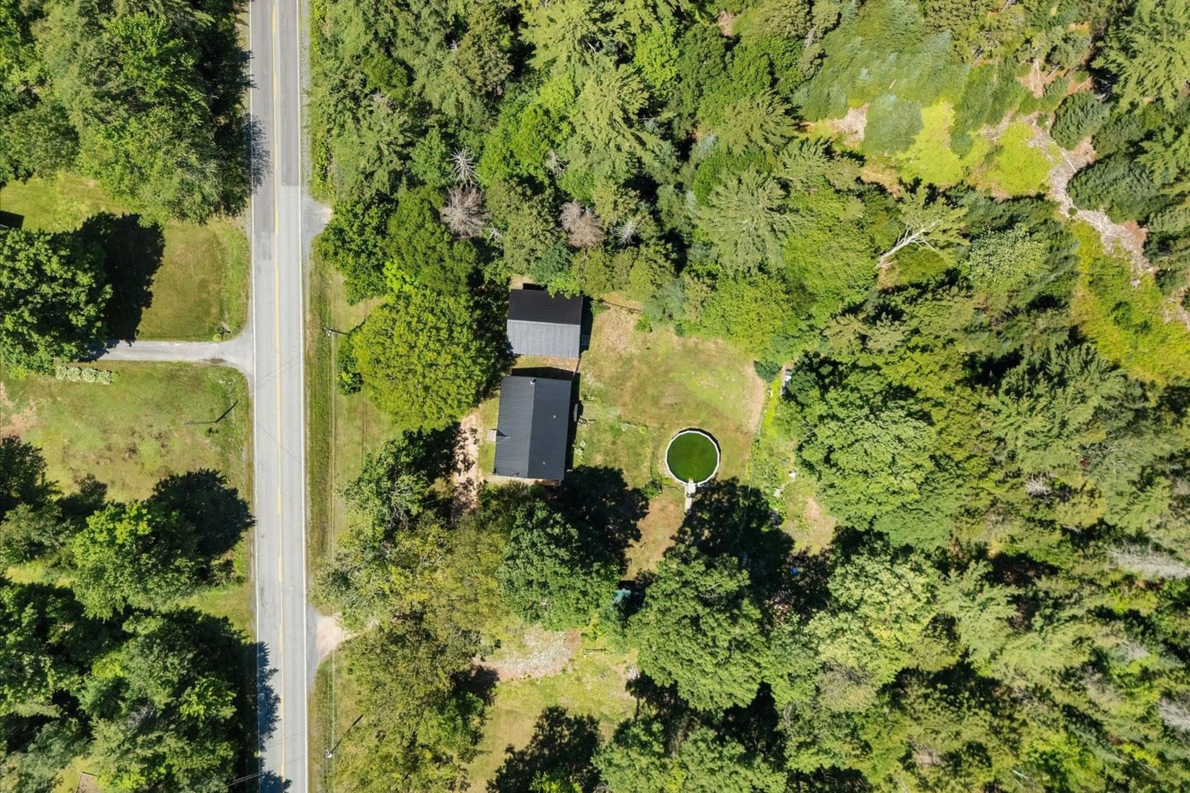 A pic from outside/outdoor area/front of a property/back of a property/a pic from drone, forest/trees view for 5720 Highway 325, West Clifford Nova Scotia B4V 8G8