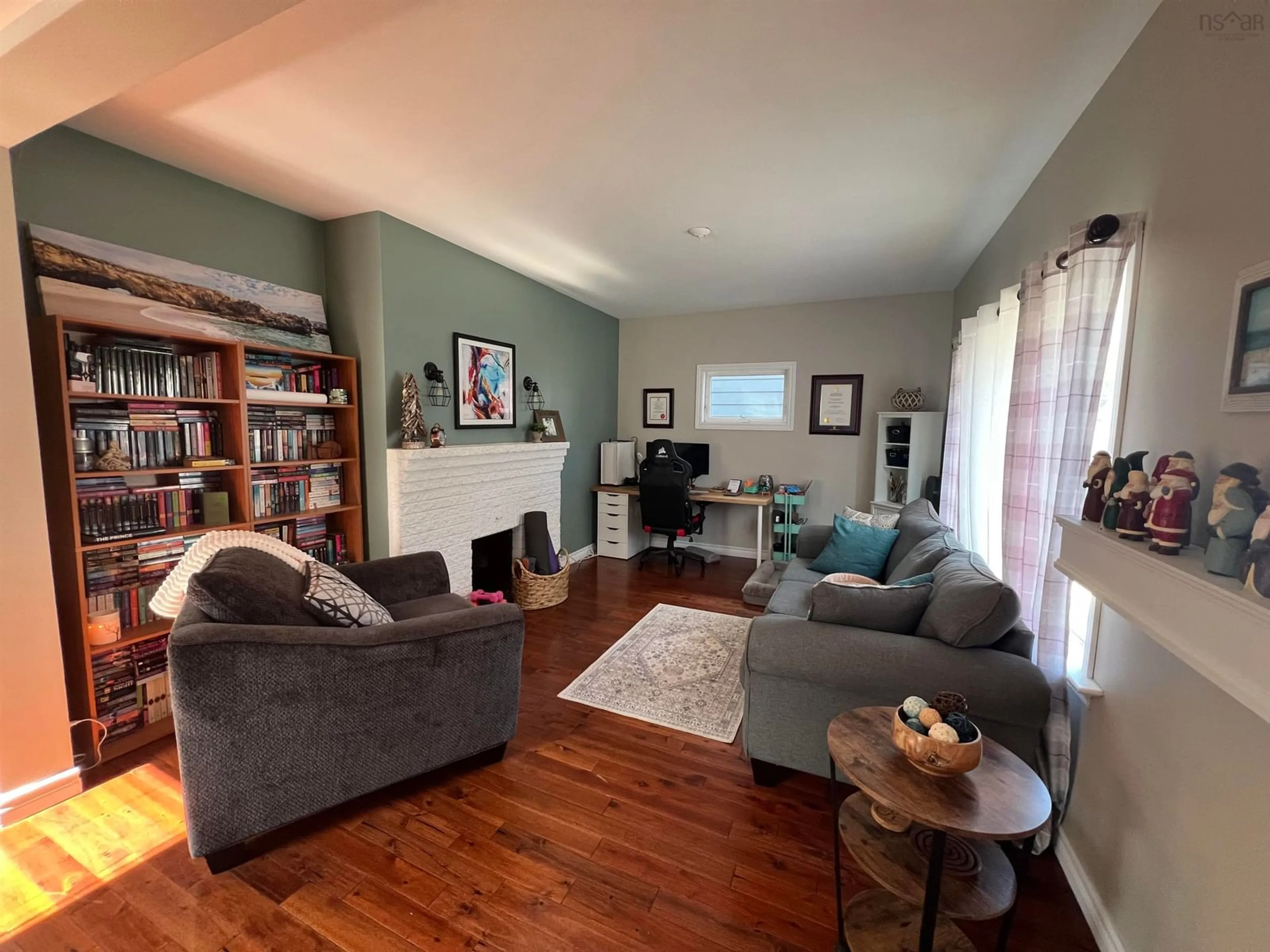 Living room with furniture, wood/laminate floor for Brunswick Street, Truro, Nova Scotia St #223, Truro Nova Scotia B2N 2H9