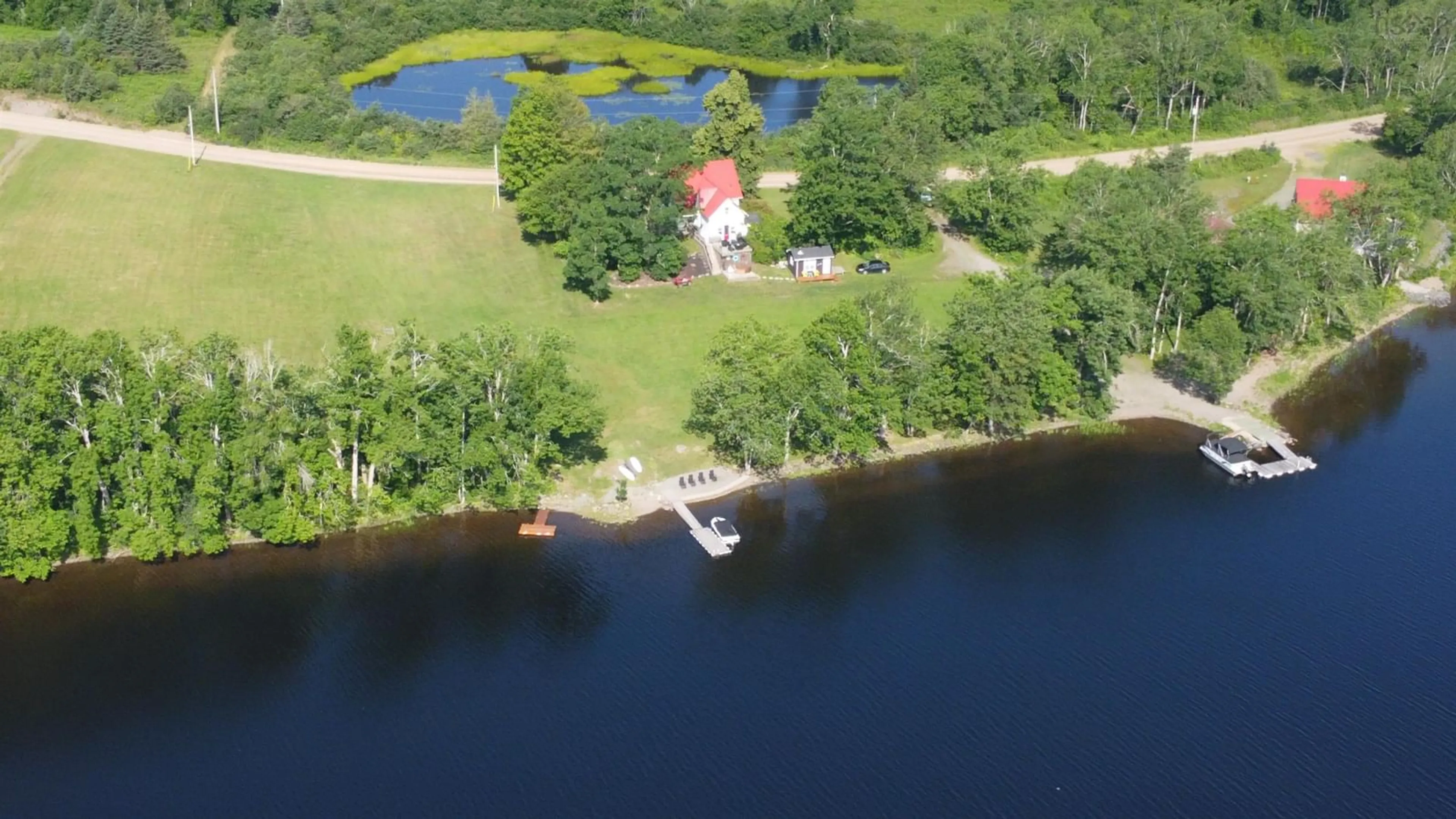 A pic from outside/outdoor area/front of a property/back of a property/a pic from drone, water/lake/river/ocean view for 346 West Side Lochaber Rd, West Lochaber Nova Scotia B2G 2L3