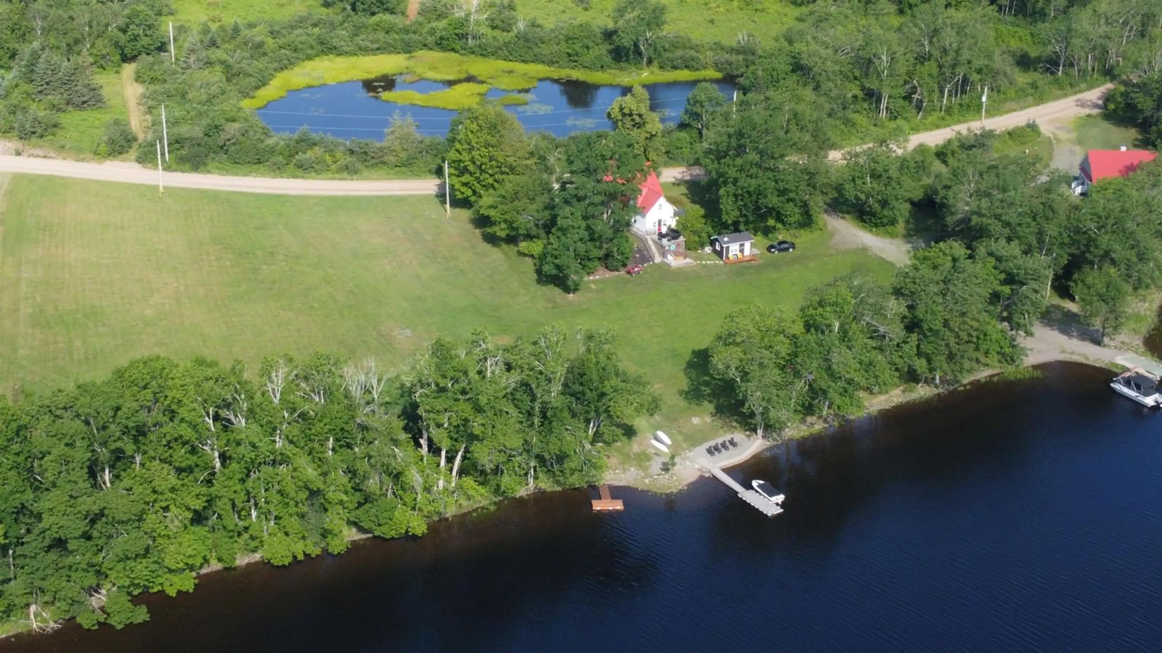 A pic from outside/outdoor area/front of a property/back of a property/a pic from drone, water/lake/river/ocean view for 346 West Side Lochaber Rd, West Lochaber Nova Scotia B2G 2L3