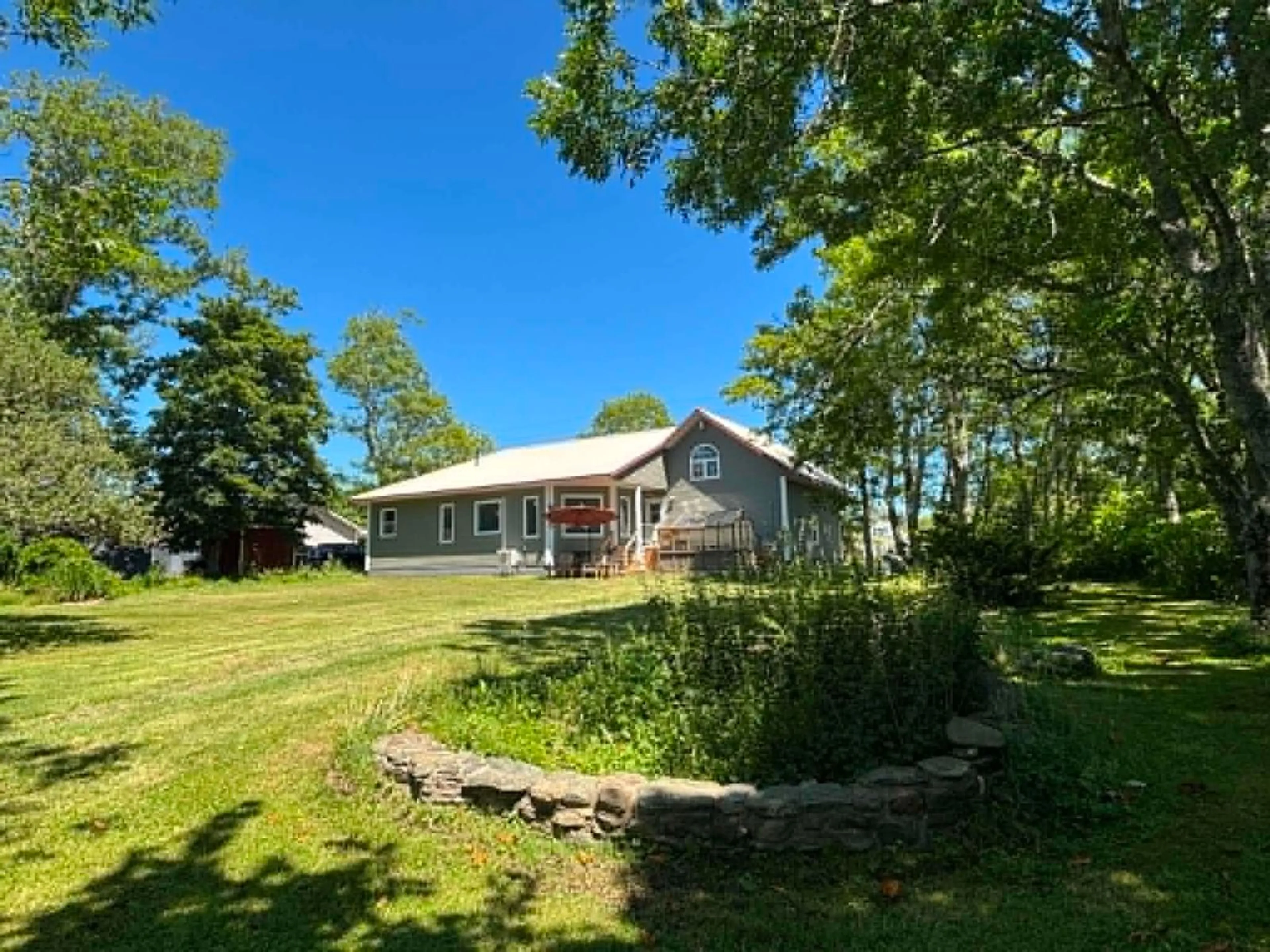 A pic from outside/outdoor area/front of a property/back of a property/a pic from drone, water/lake/river/ocean view for 34 Clements Ave, Yarmouth Nova Scotia B5A 2L7