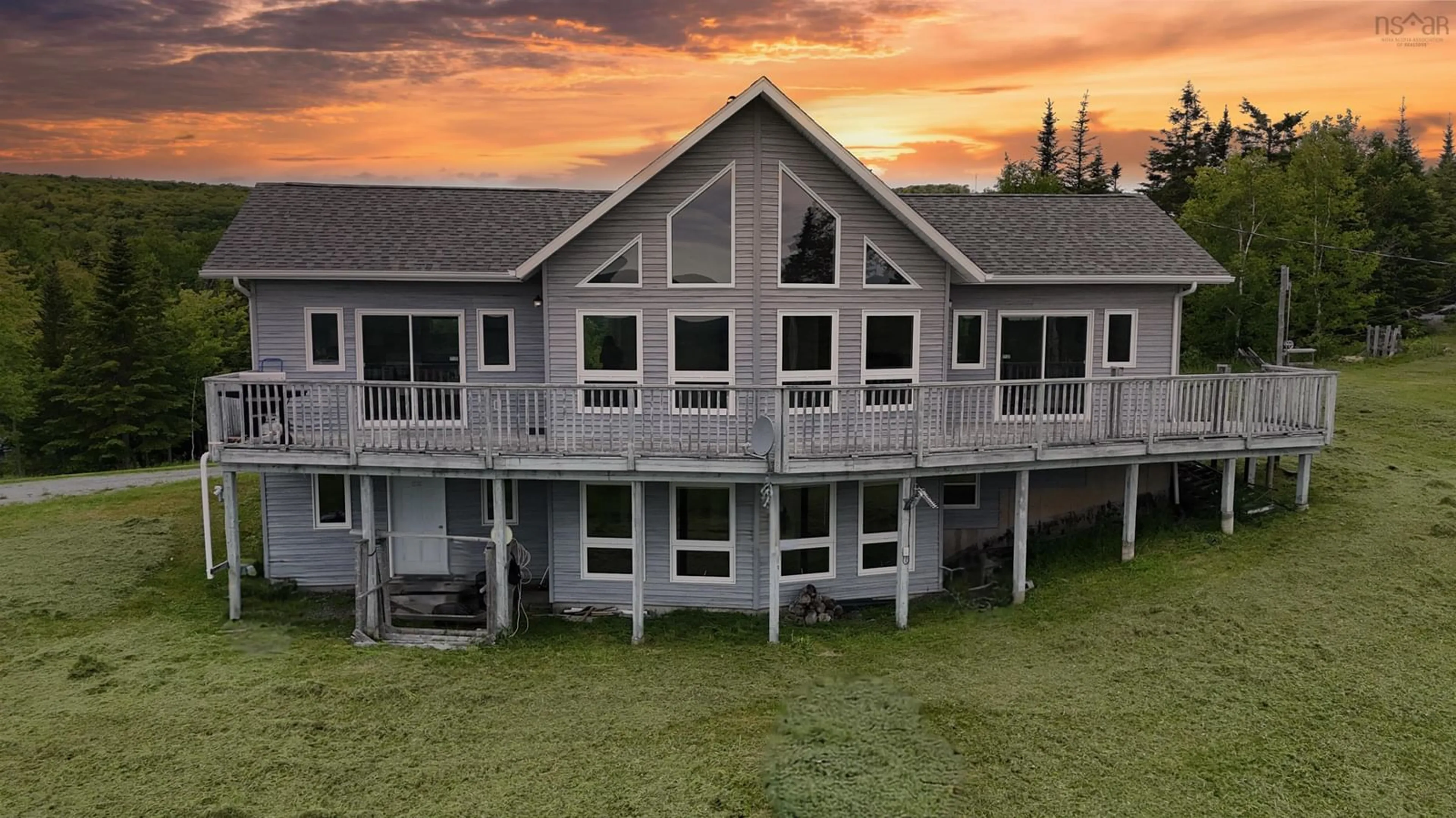 A pic from outside/outdoor area/front of a property/back of a property/a pic from drone, building for 2420 Coxheath Rd, Blacketts Lake Nova Scotia B1L 1A5