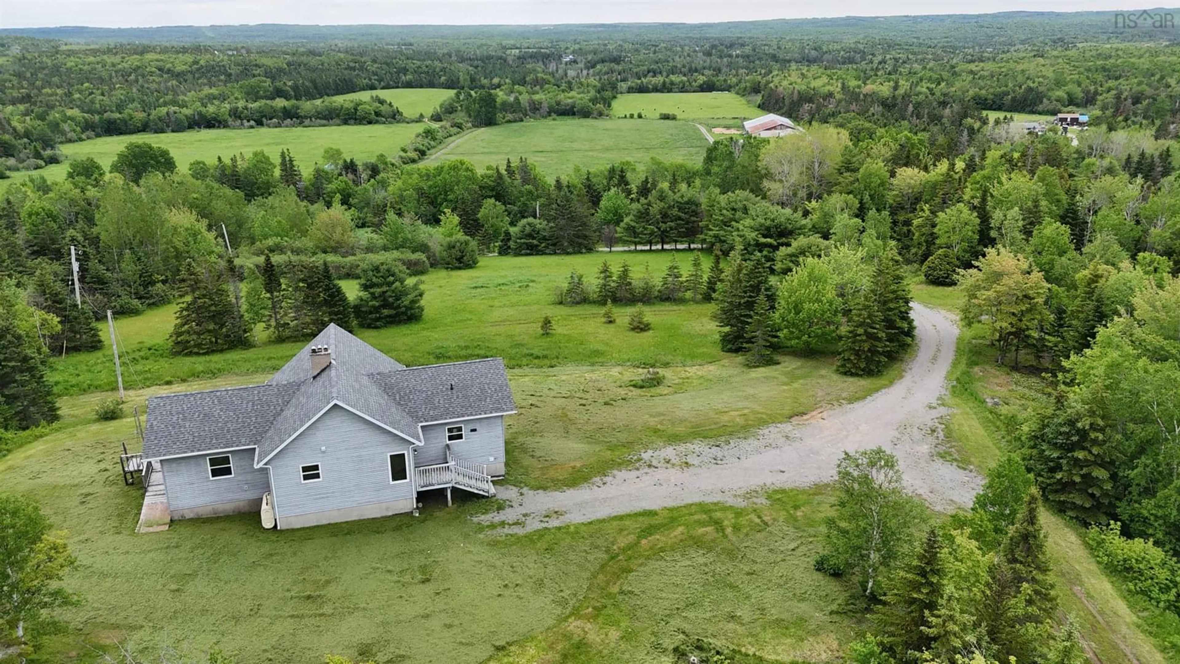 A pic from outside/outdoor area/front of a property/back of a property/a pic from drone, mountain view for 2420 Coxheath Rd, Blacketts Lake Nova Scotia B1L 1A5